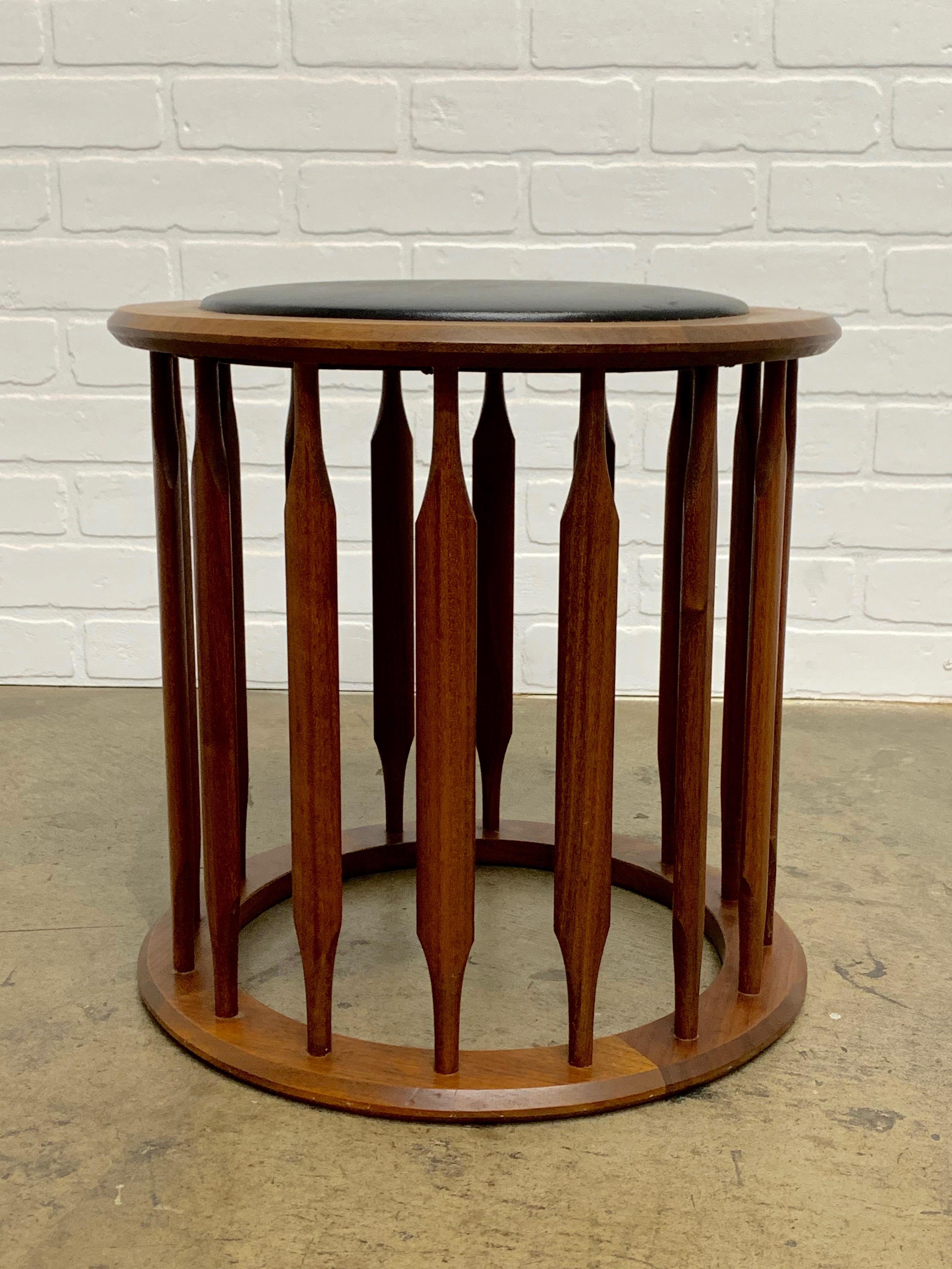 Designed by Kipp Stewart for Drexel solid walnut with original vinyl seat.