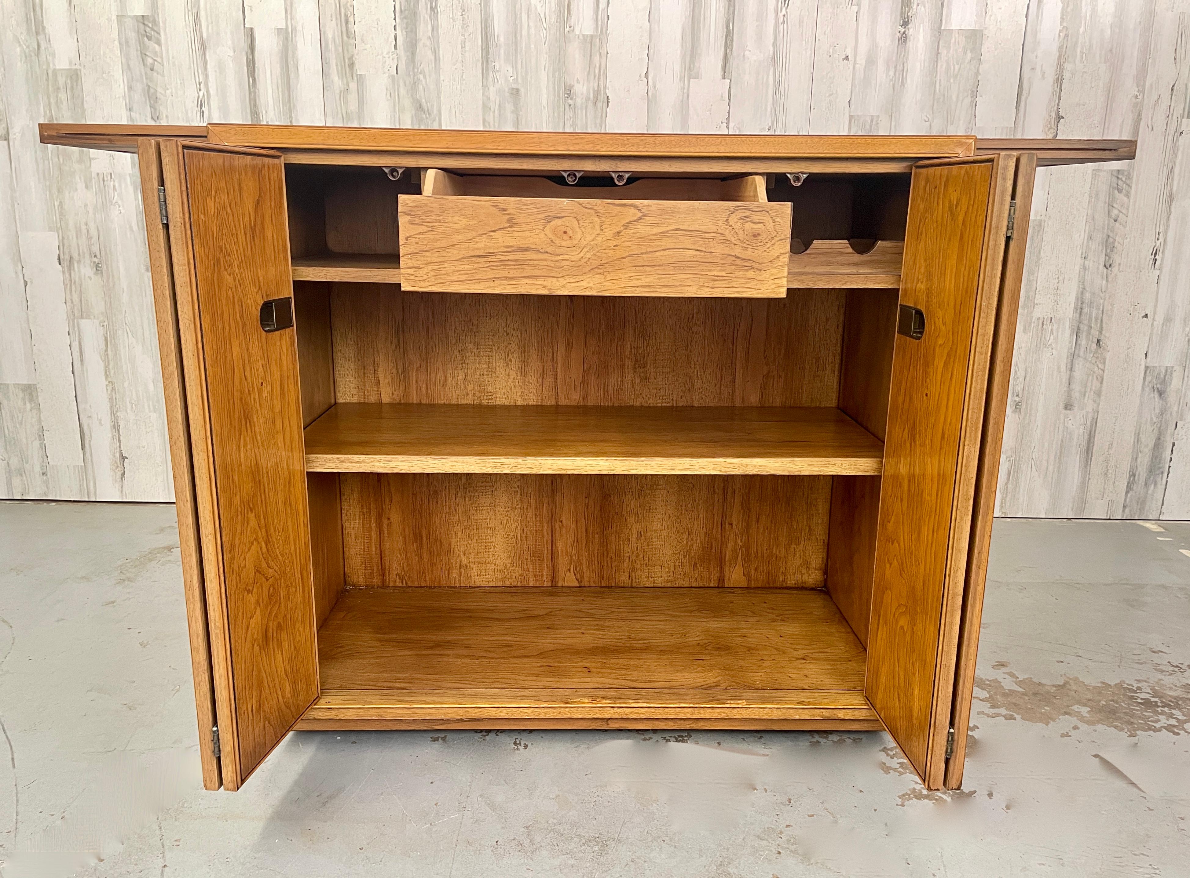 Brass Drexel Extendable Top Liquor Cabinet For Sale