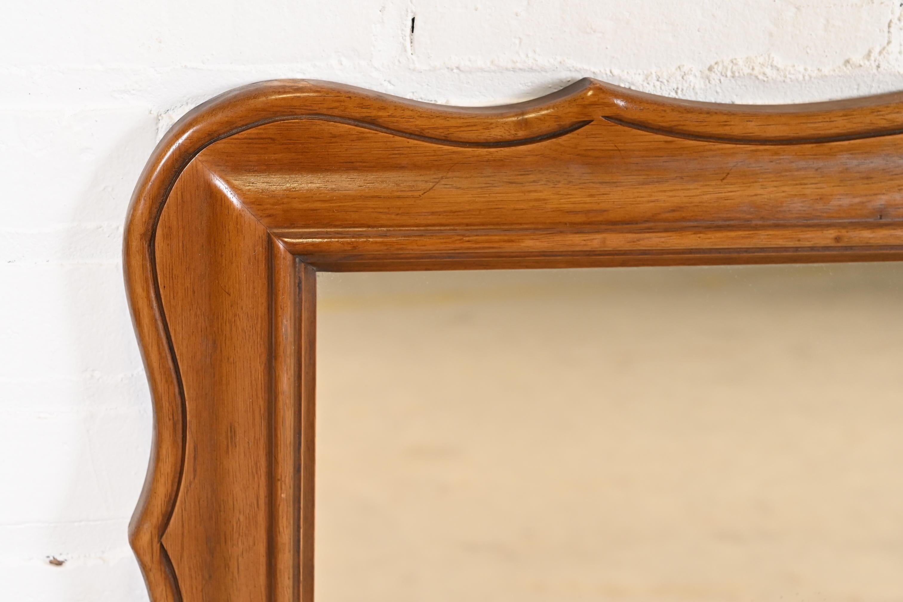 Drexel French Provincial Louis XV Carved Walnut Framed Wall Mirror, 1960s In Good Condition In South Bend, IN