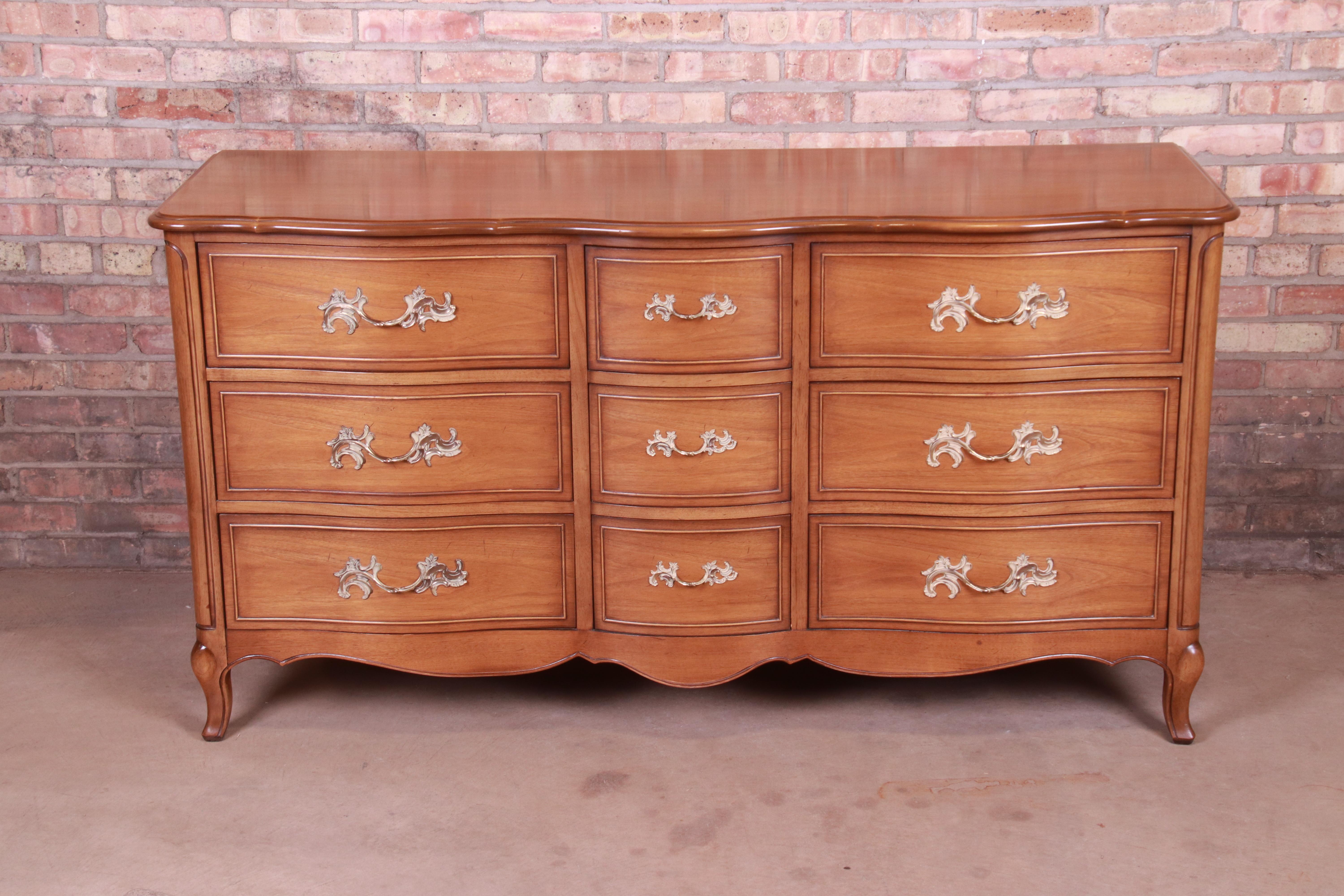 American Drexel French Provincial Louis XV Carved Walnut Triple Dresser, circa 1950s