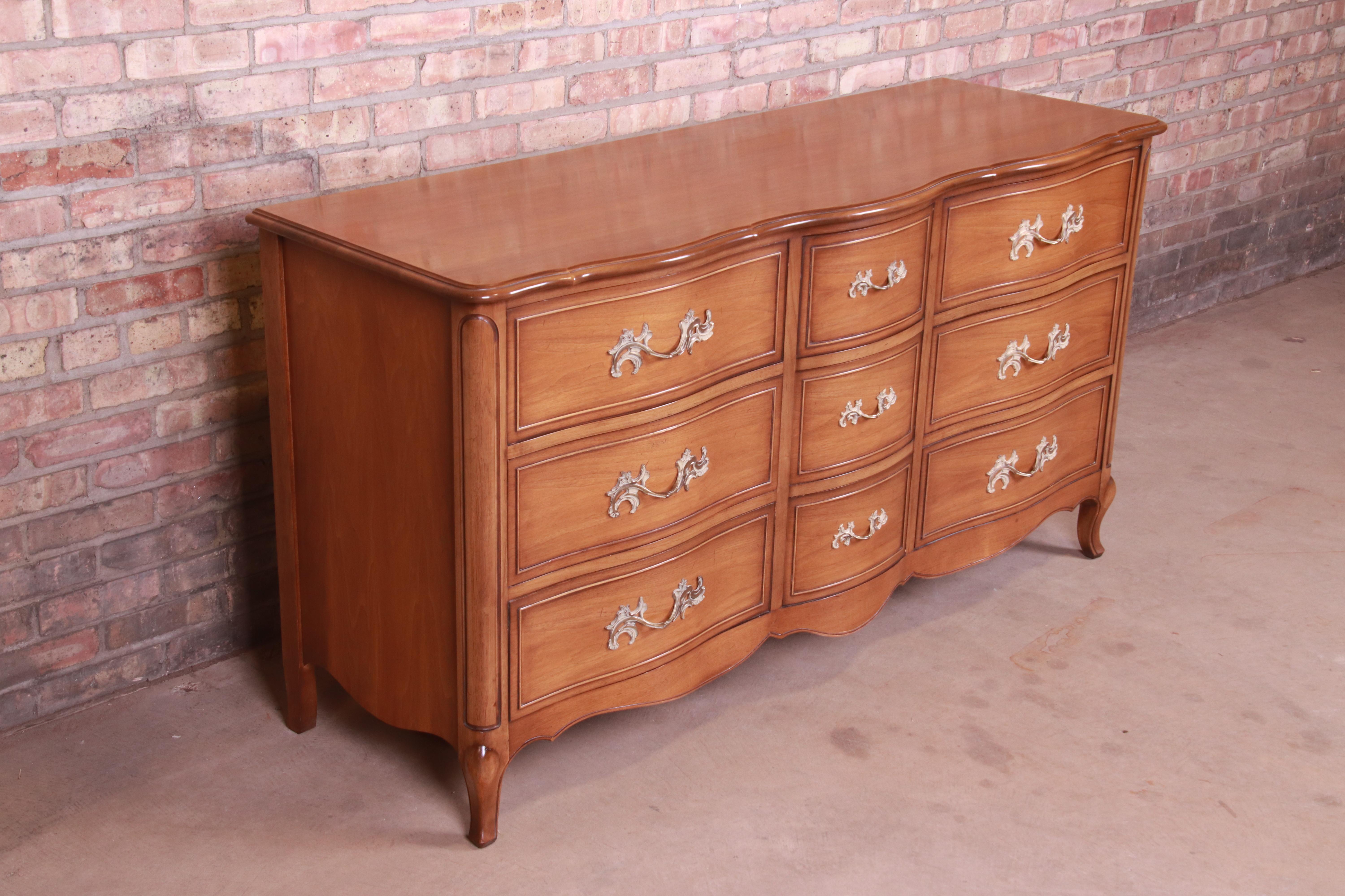 20th Century Drexel French Provincial Louis XV Carved Walnut Triple Dresser, circa 1950s