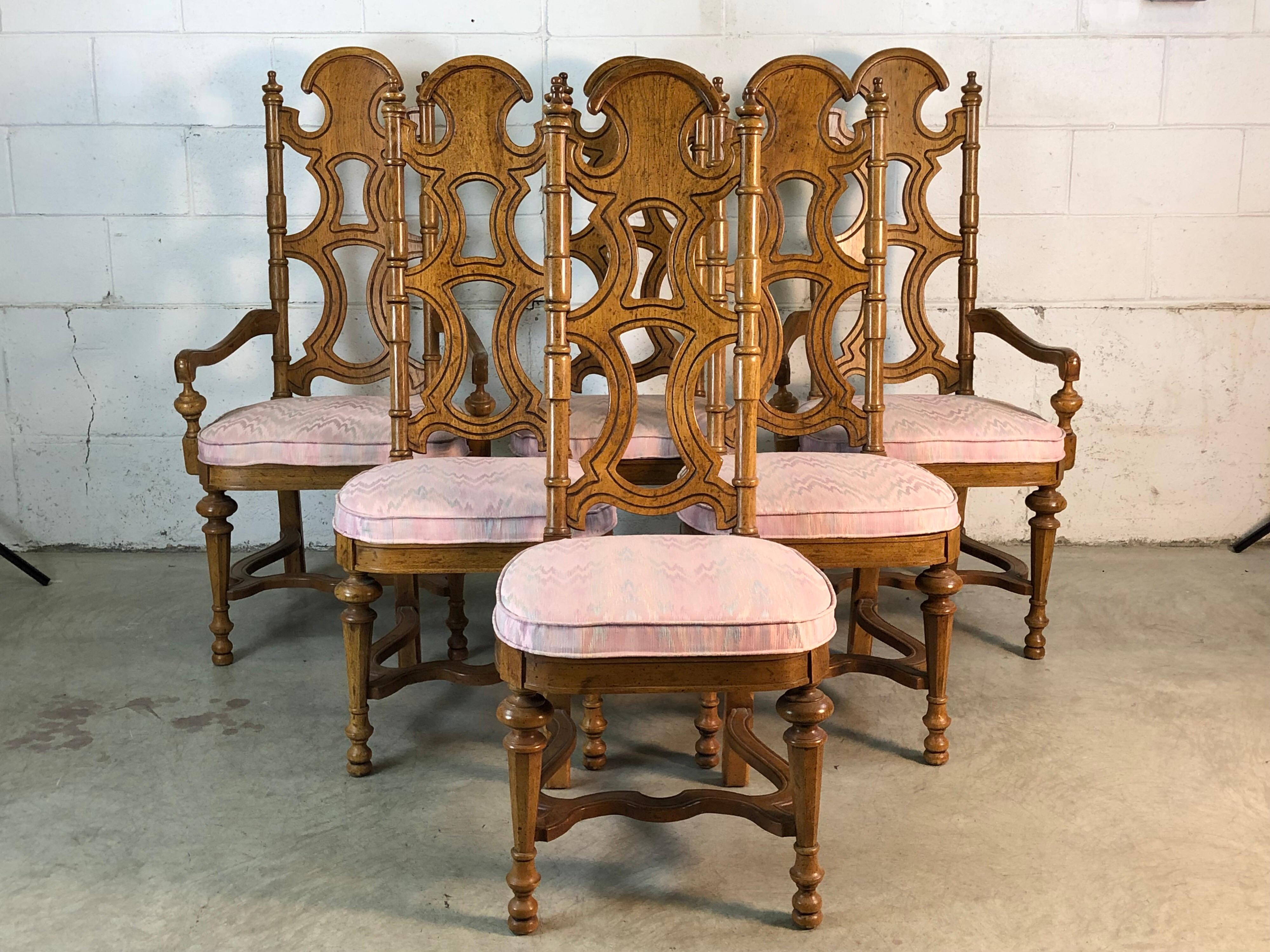 1980s Drexel Furniture Co high back set of 6 dining room chairs. Two of the chairs are captain chairs. These chairs are very sturdy and heavy. The wood has black flecks in it. 
Captain chairs: 24”L x 19”W x 46.5”H. All marked. Recommend the fabric