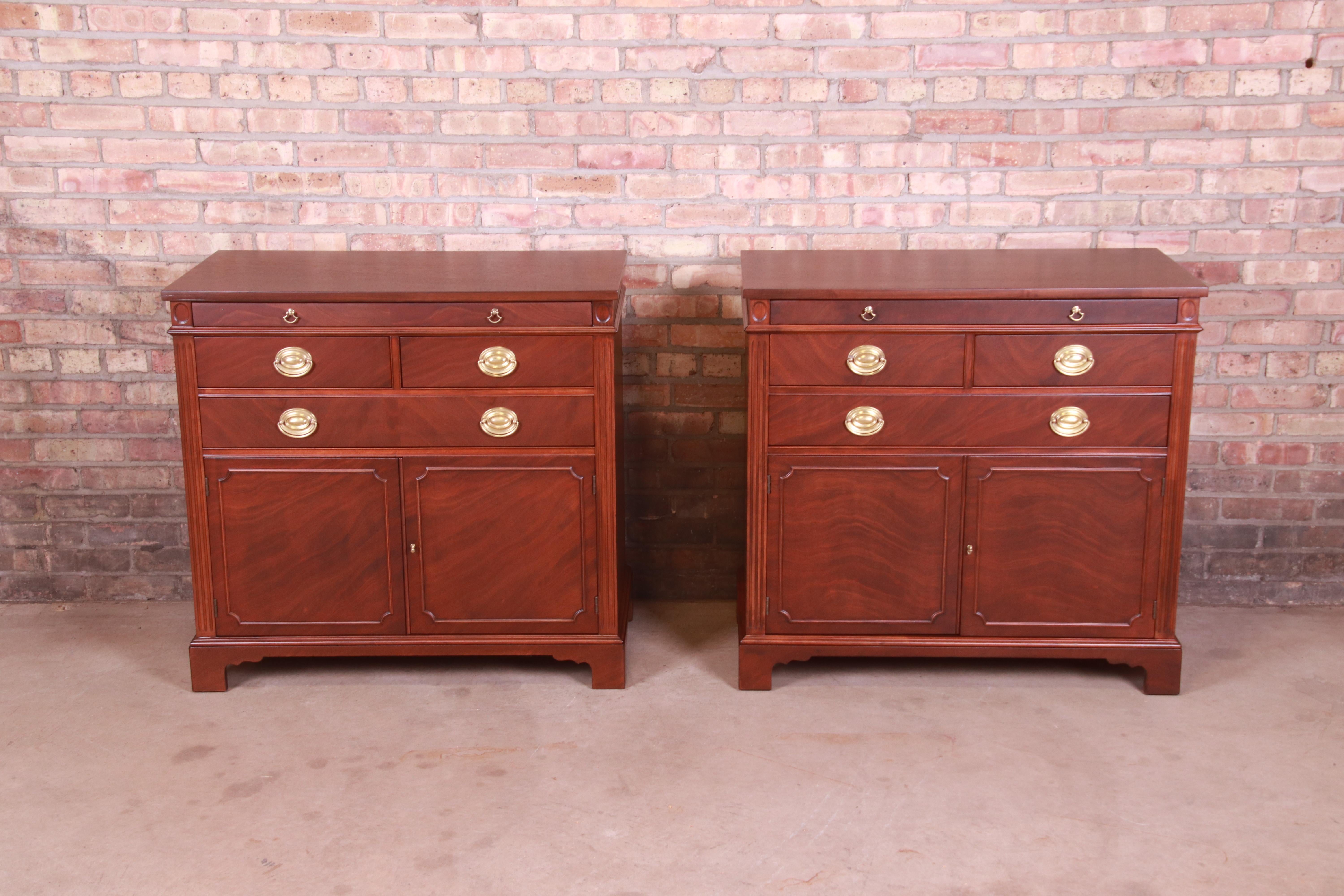 A gorgeous pair of mid-century Georgian style sideboard buffets or bar cabinets

By Drexel Furniture, 