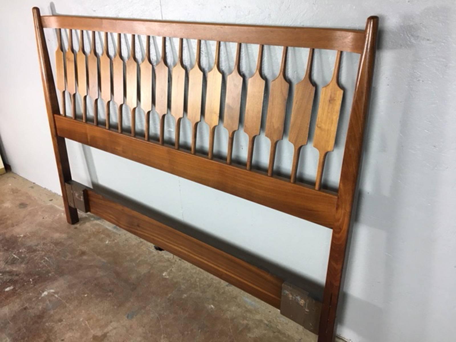 Full size headboard by Drexel in walnut. Excellent condition.