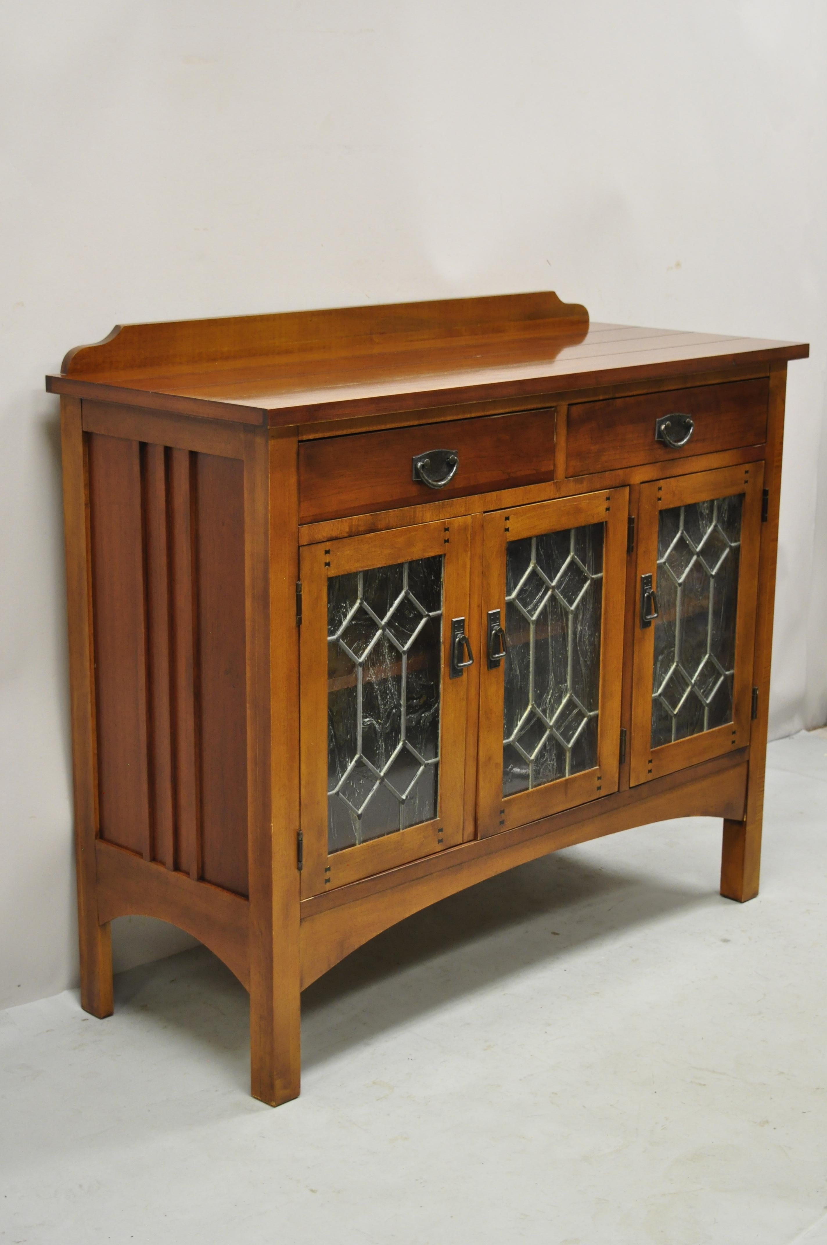 Drexel Heritage American review Arts & Crafts mission cherry wood sideboard buffet glass doors. Item features leaded glass 