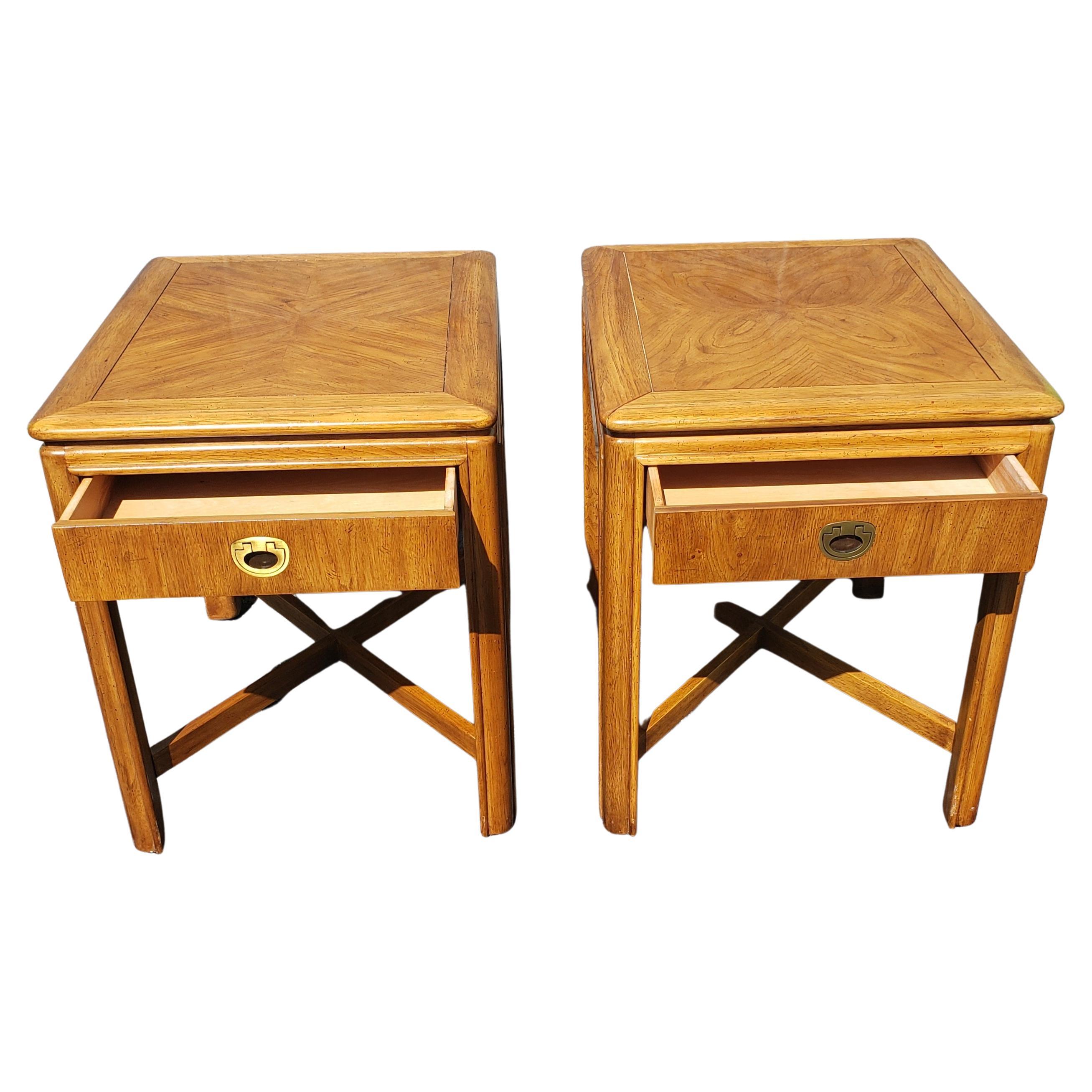 Pair of 1970s Drexel Heritage Furnishing campaign style side tables. Excellent vintage condition. 
Measurements are 21.25