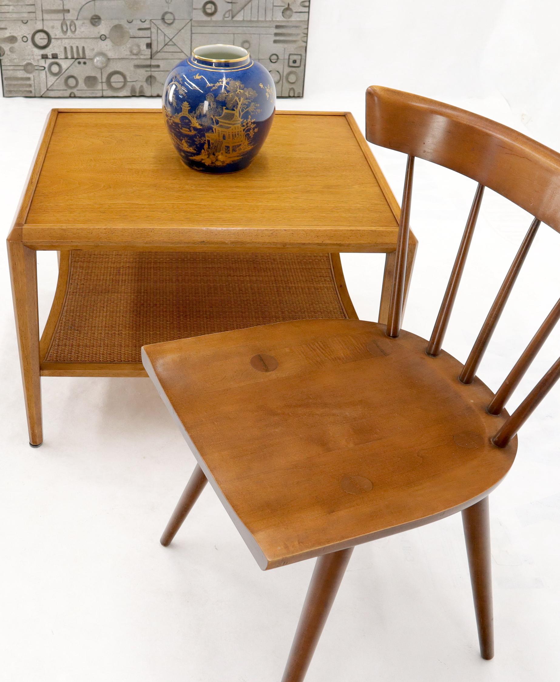 Mid-Century Modern light fruitwood or walnut rectangular side table with cane shelf by Drexel Heritage.