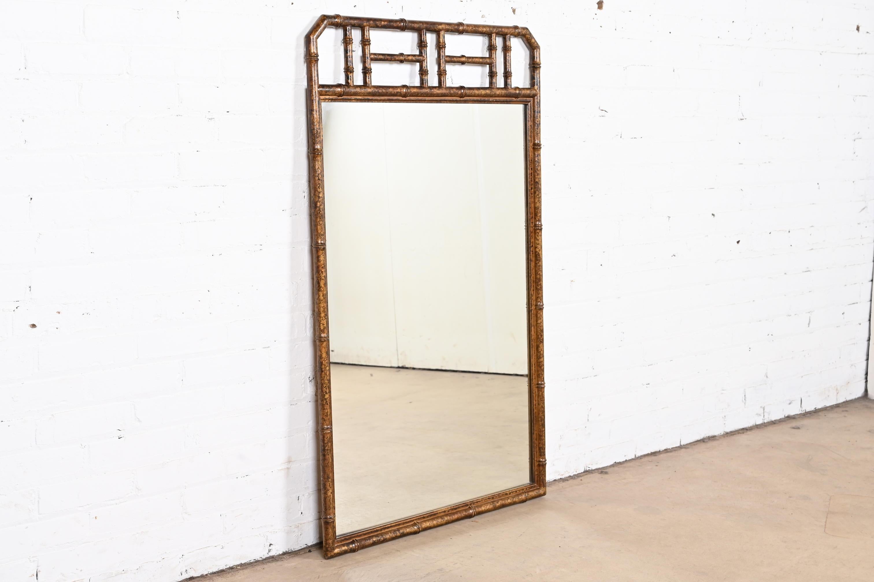 A gorgeous Mid-Century Modern Hollywood Regency chinoiserie style wall mirror

By Drexel Heritage

USA, circa 1970s

Faux bamboo frame, in faux tortoise shell finish.

Measures: 28.25