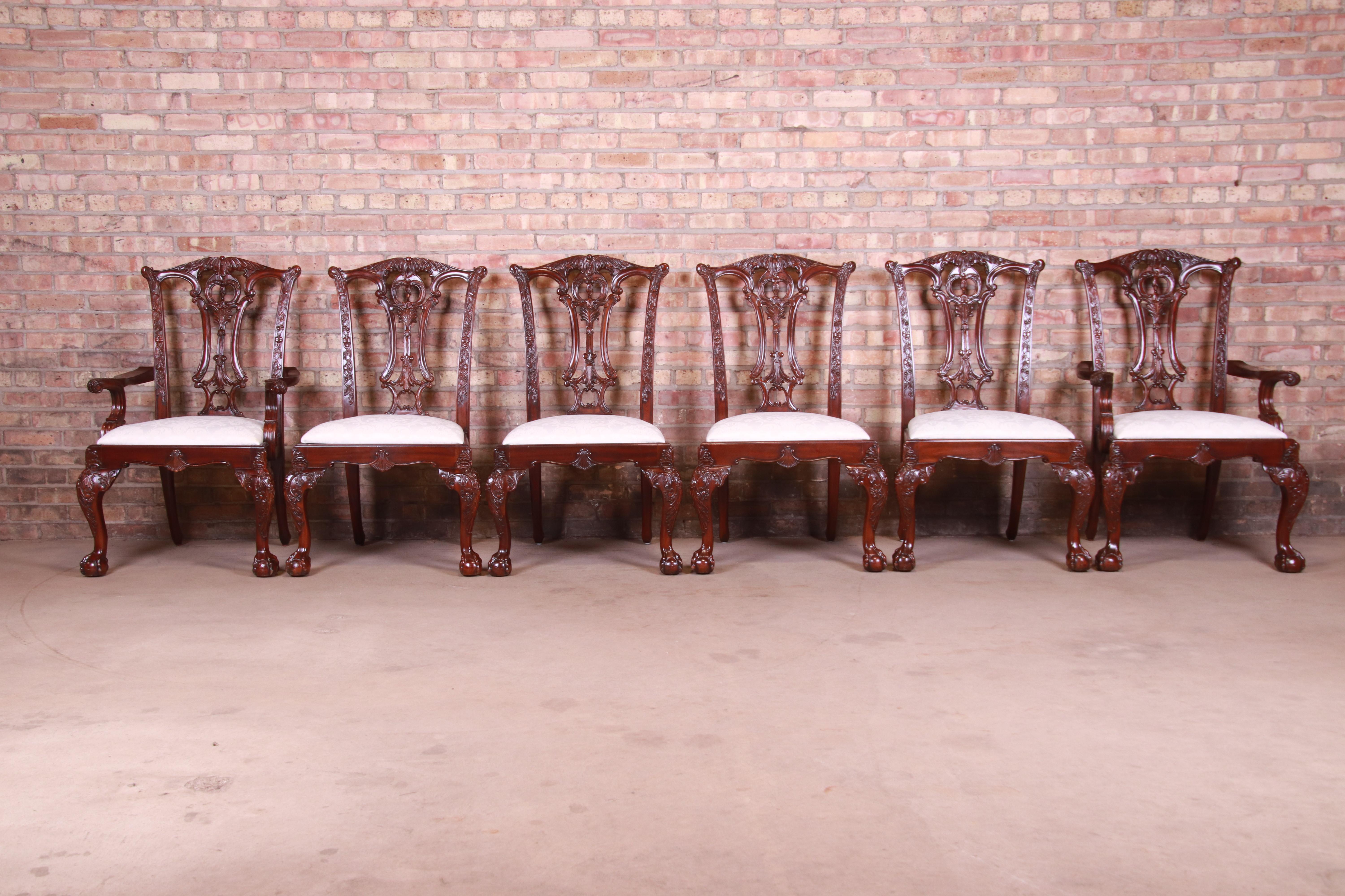 A gorgeous set of six Chippendale style carved mahogany dining chairs

By Drexel Heritage

Circa 1990s

Solid carved mahogany frames, with upholstered seats.

Measures:
Armchairs - 25.5
