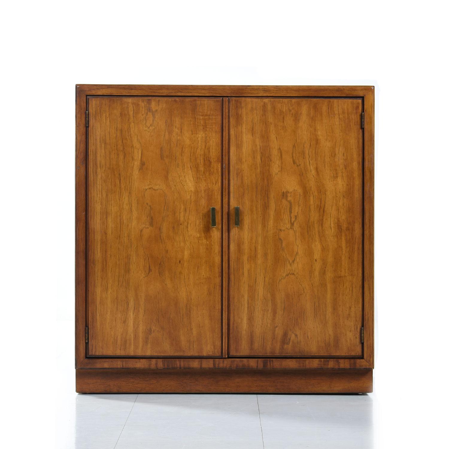 We have two cabinets available. Each sold independently. 

Old growth flared grain flaxen pecan inside and out. Super-sleek profile with practicality maximized throughout. If you are in a condo, small home or office this multifunctional piece is