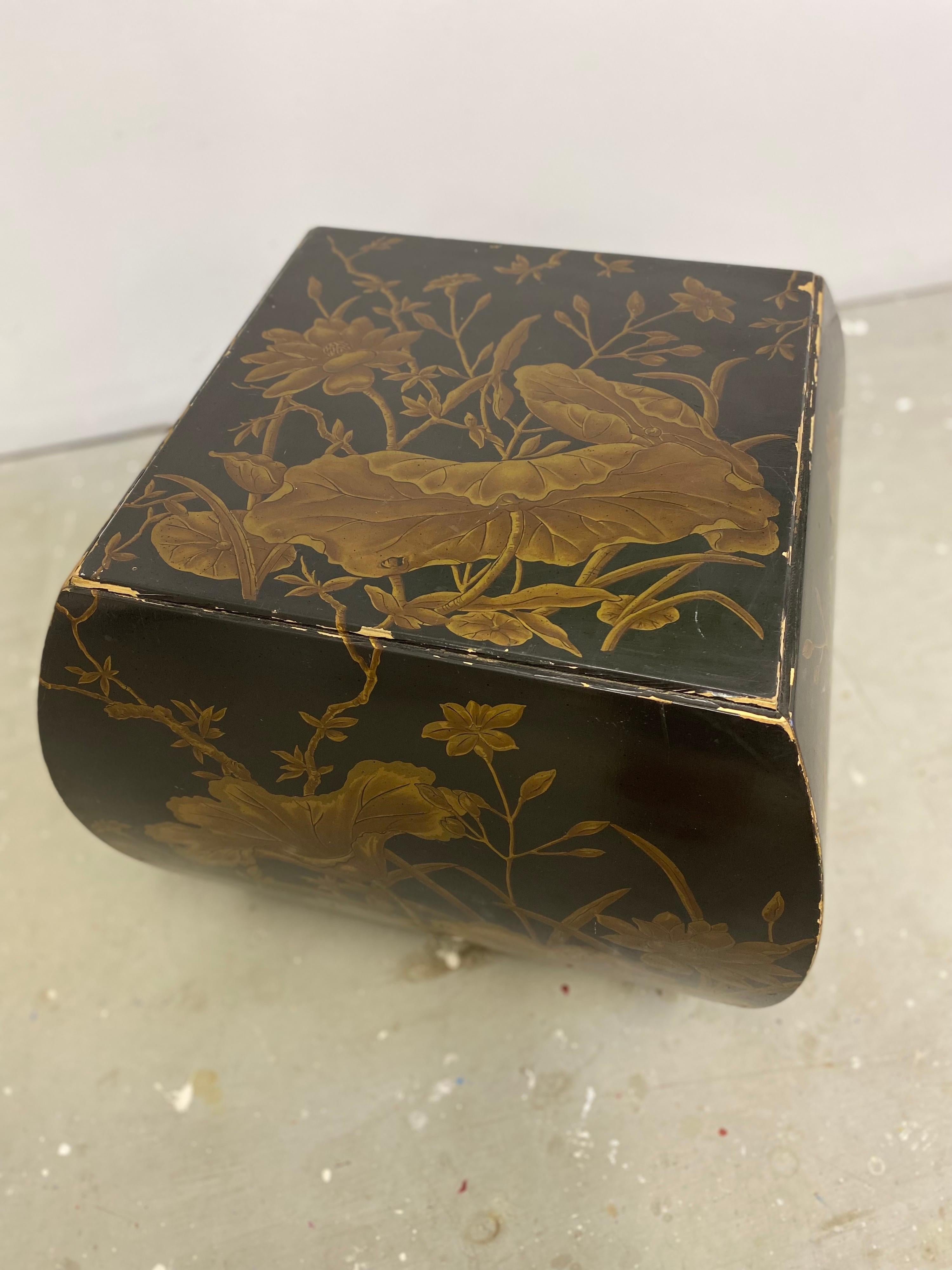 Drexel heritage cube designed by Randy Yancey. Asian inspired cube with gold leaf floral design throughout. Edge wear throughout cube. Overall has a great presence!