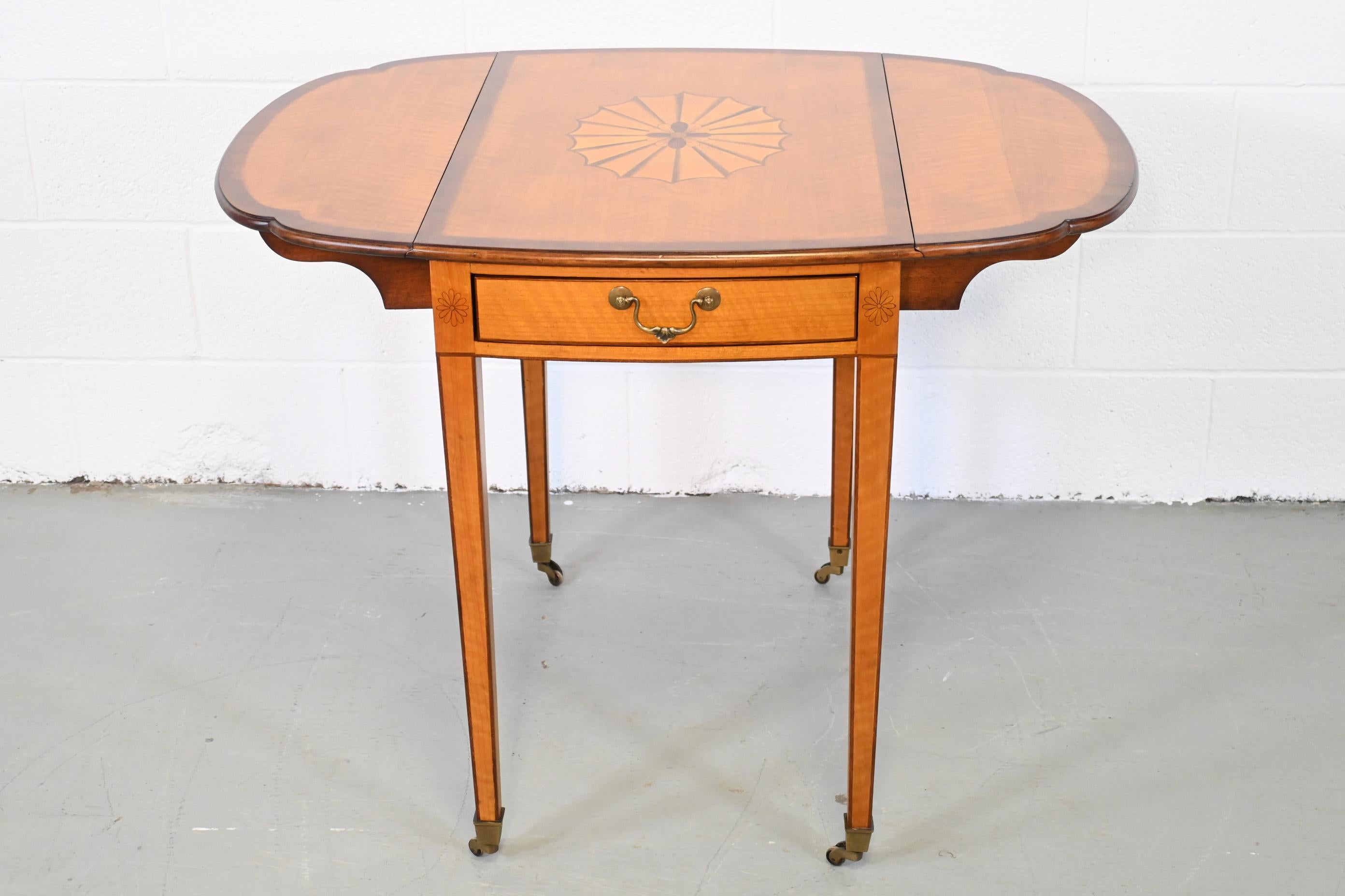 Drexel Heritage pembroke table with drop leaves

Drexel Heritage, USA, 2000s

Measures: 19.5 Wide x 29.25 Deep x 28.25 High. Fully extended 37.88 Wide.

Banded edge drop leaf table with inlaid medallion. Sits on brass