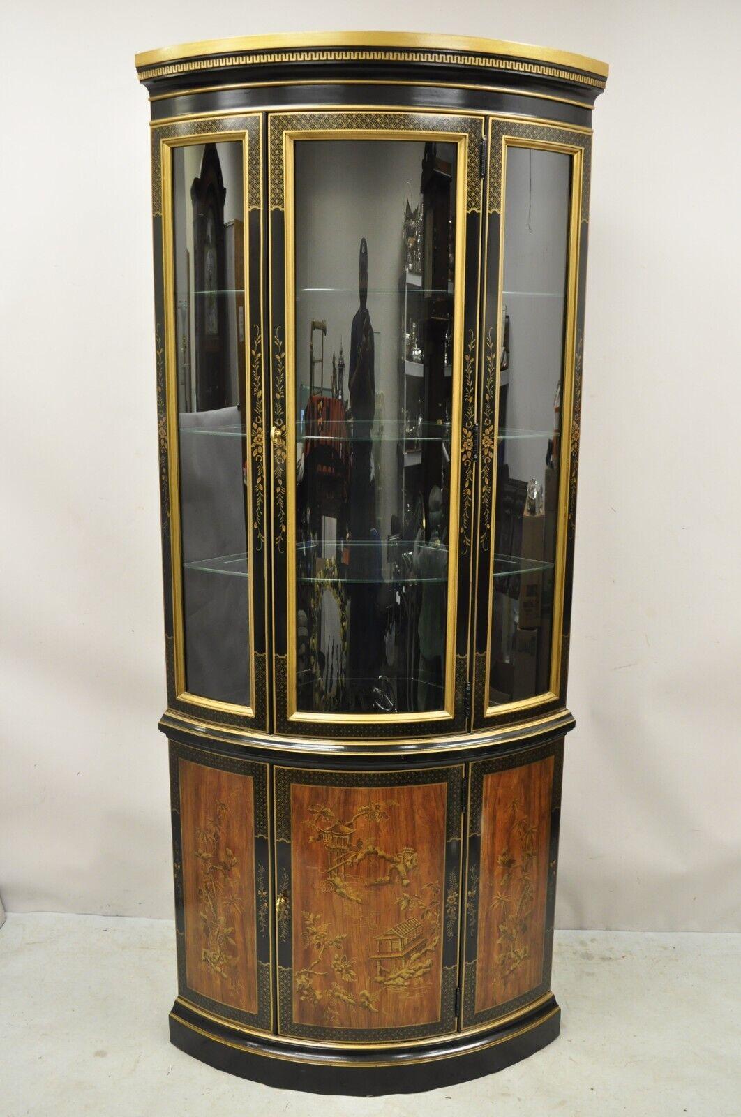 Drexel Heritage Et Cetera Black and Gold Chinoiserie Bow Front China Display Cabinet. Item featured has hand painted details, lighted interior, bowed front, original label, quality American craftsmanship. Circa Mid 20th Century. Measurements: 78