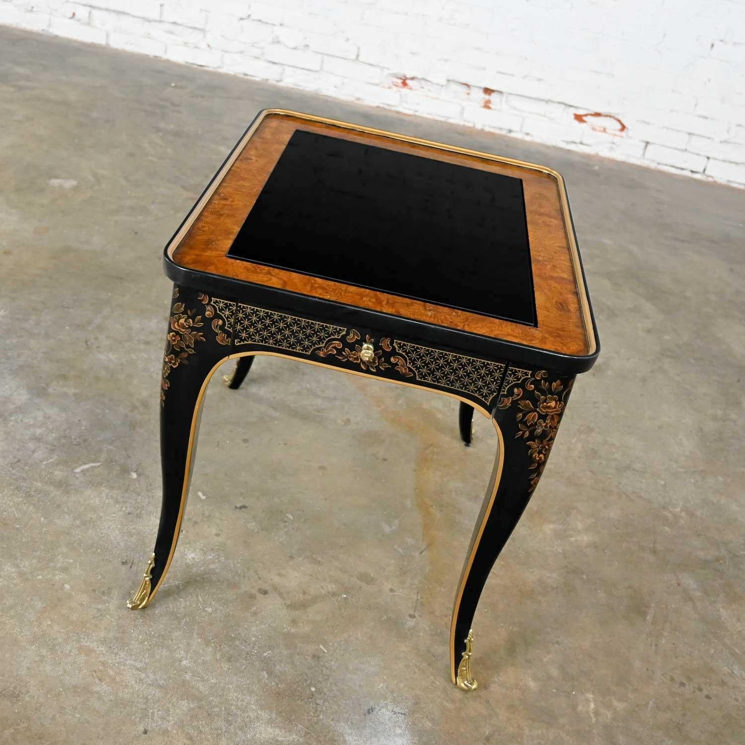 Outstanding Drexel Heritage ET Cetera collection chinoiserie black painted and burl end table or side table with gold detail and ormolu accents. Beautiful condition, keeping in mind that this is vintage and not new so will have signs of use and