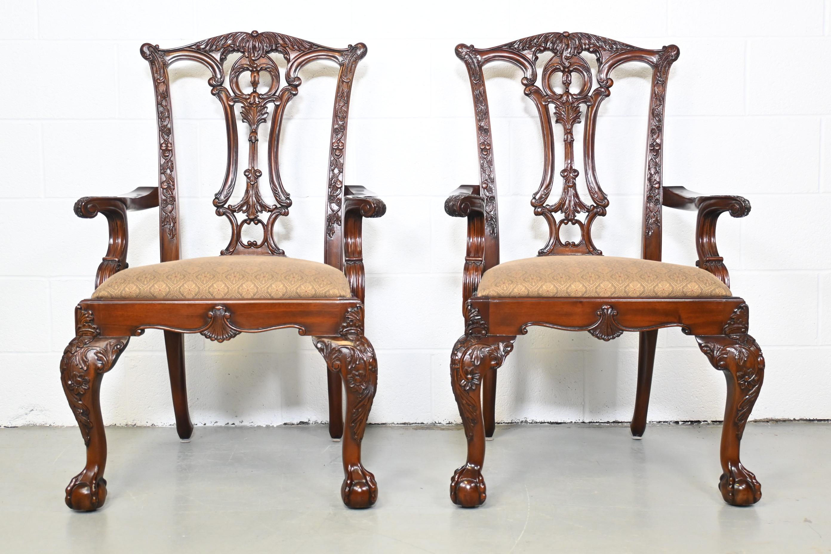 Drexel Heritage French Chippendale Pair of Arm Chairs

Drexel Heritage, 2000s

Measures: 22.5 Wide x 18.5 Deep x 40 High. Seat Height 18.5.

Pair of ornately carved french chippendale traditional arm chairs with cloth upholstery.

Great