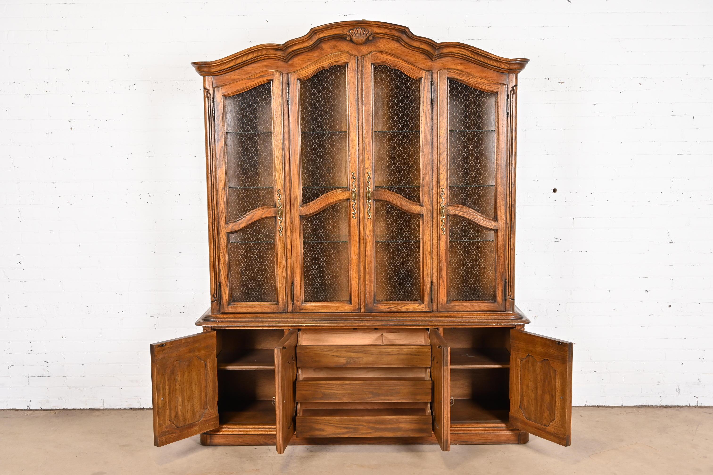 Drexel Heritage French Provincial Carved Oak Lighted Breakfront Bookcase Cabinet For Sale 6