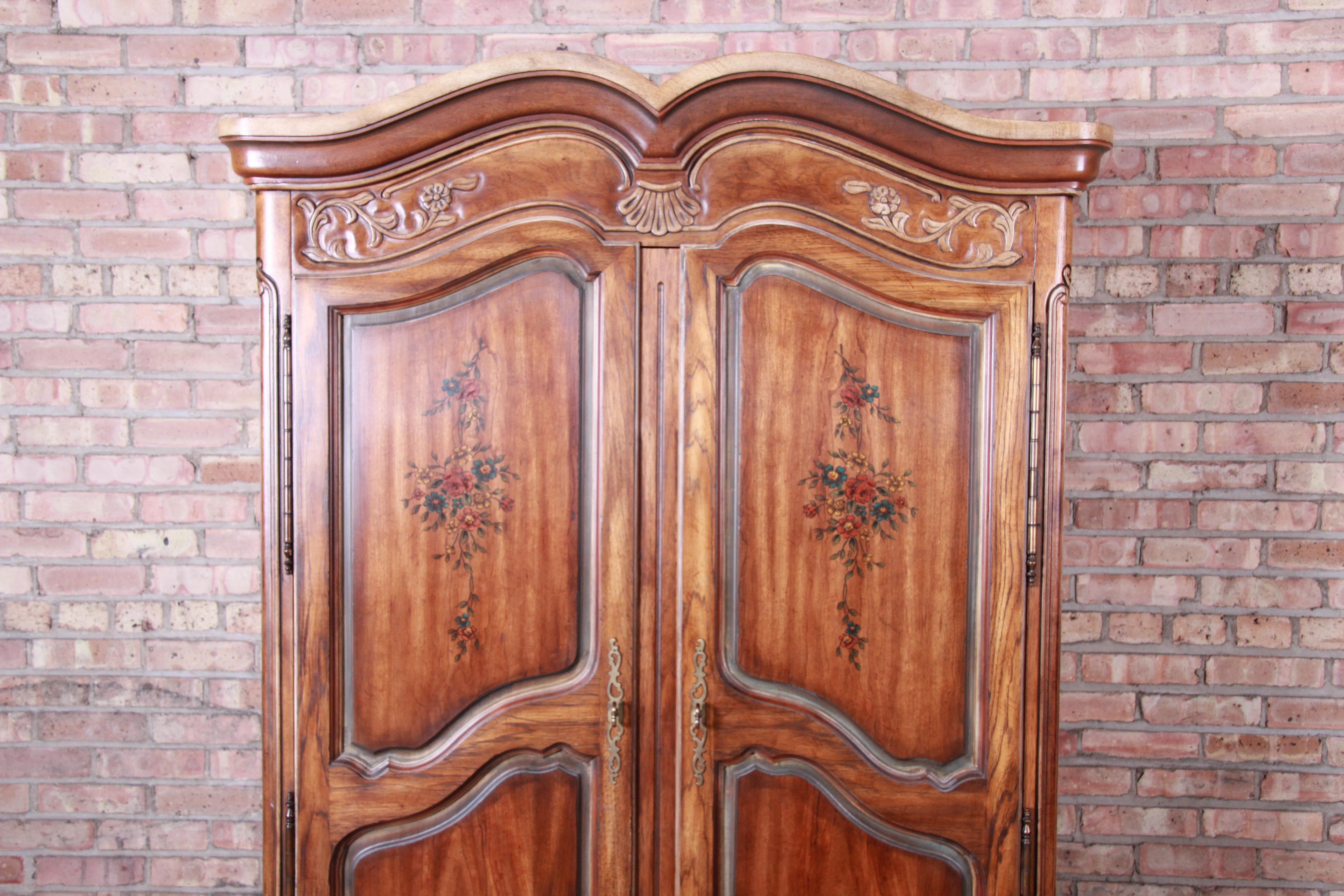 A gorgeous French Provincial Louis XV style carved walnut wardrobe dresser chest of drawers with shell motif and painted floral accents

By Drexel Heritage 