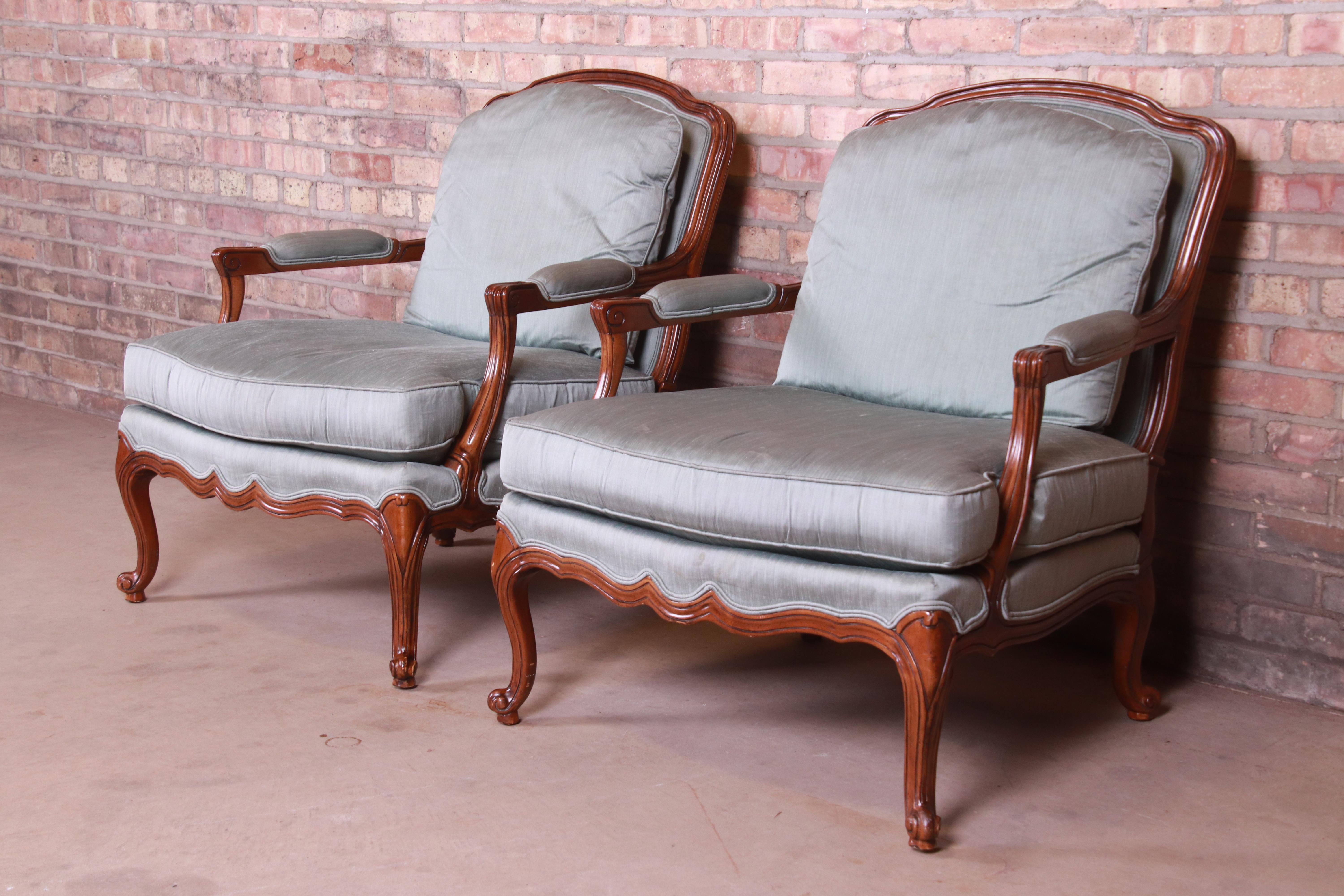 American Drexel Heritage French Provincial Louis XV Carved Walnut Bergère Chairs, Pair
