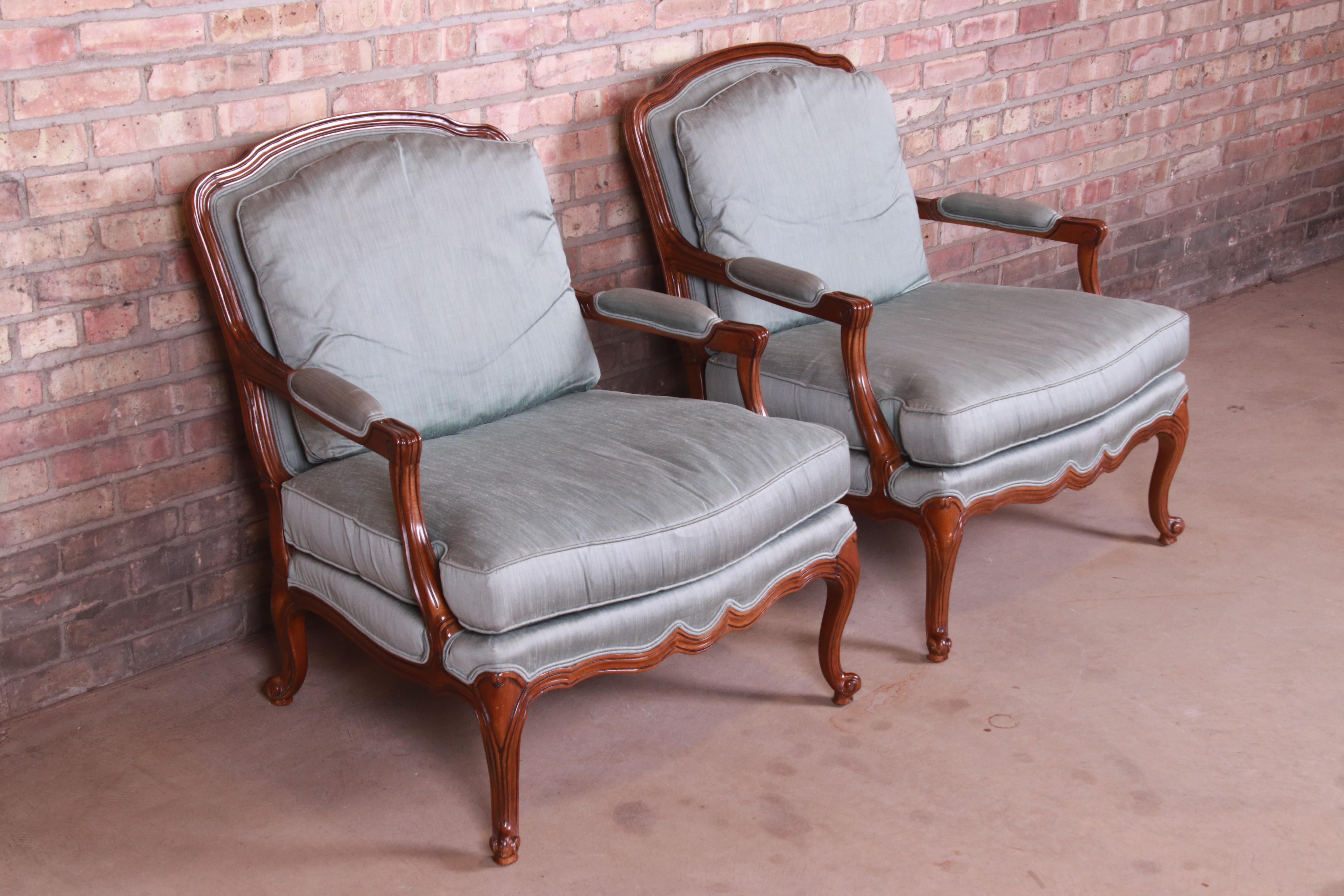 Upholstery Drexel Heritage French Provincial Louis XV Carved Walnut Bergère Chairs, Pair