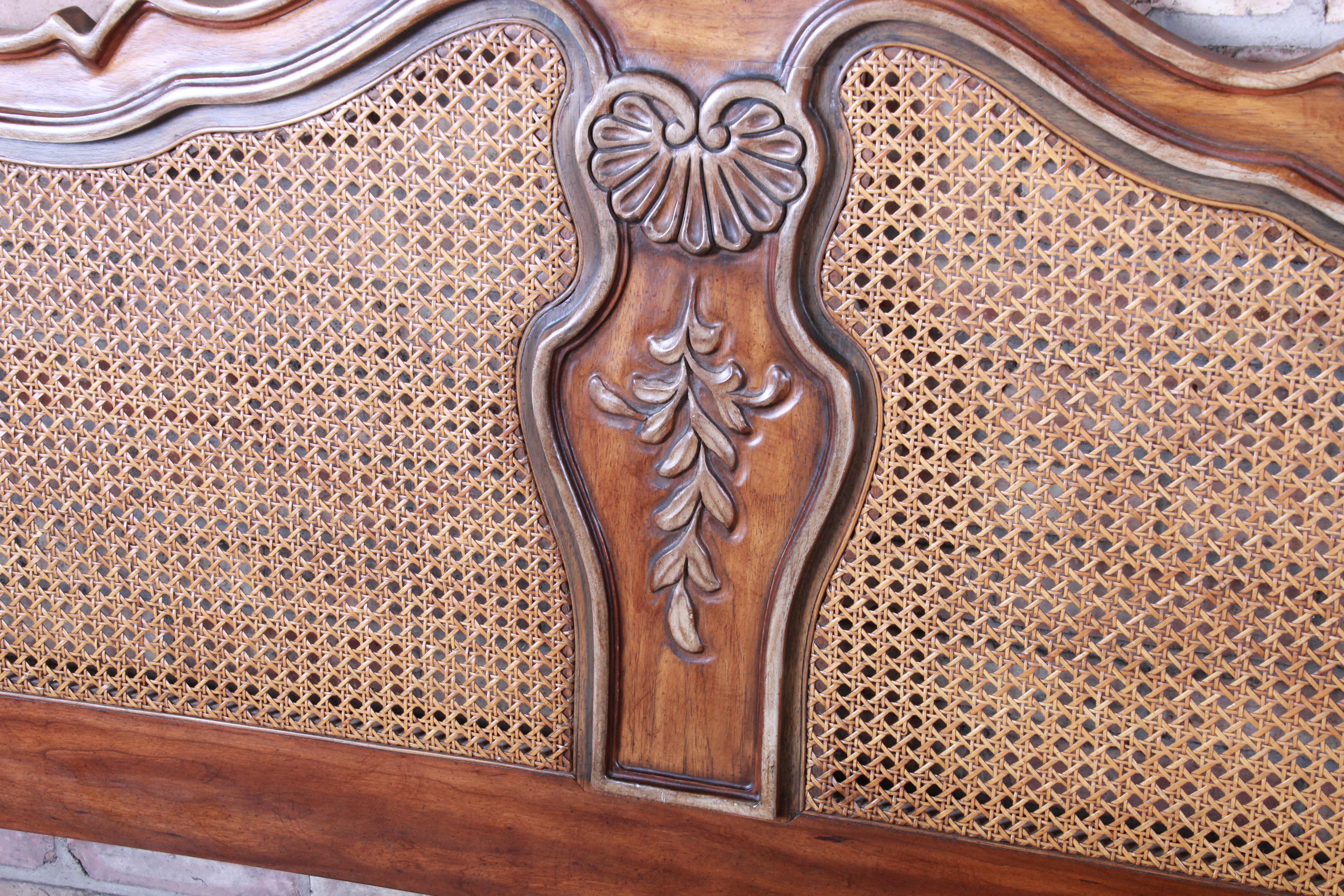 A gorgeous French Provincial Louis XV style carved walnut and cane king size headboard

By Drexel Heritage 