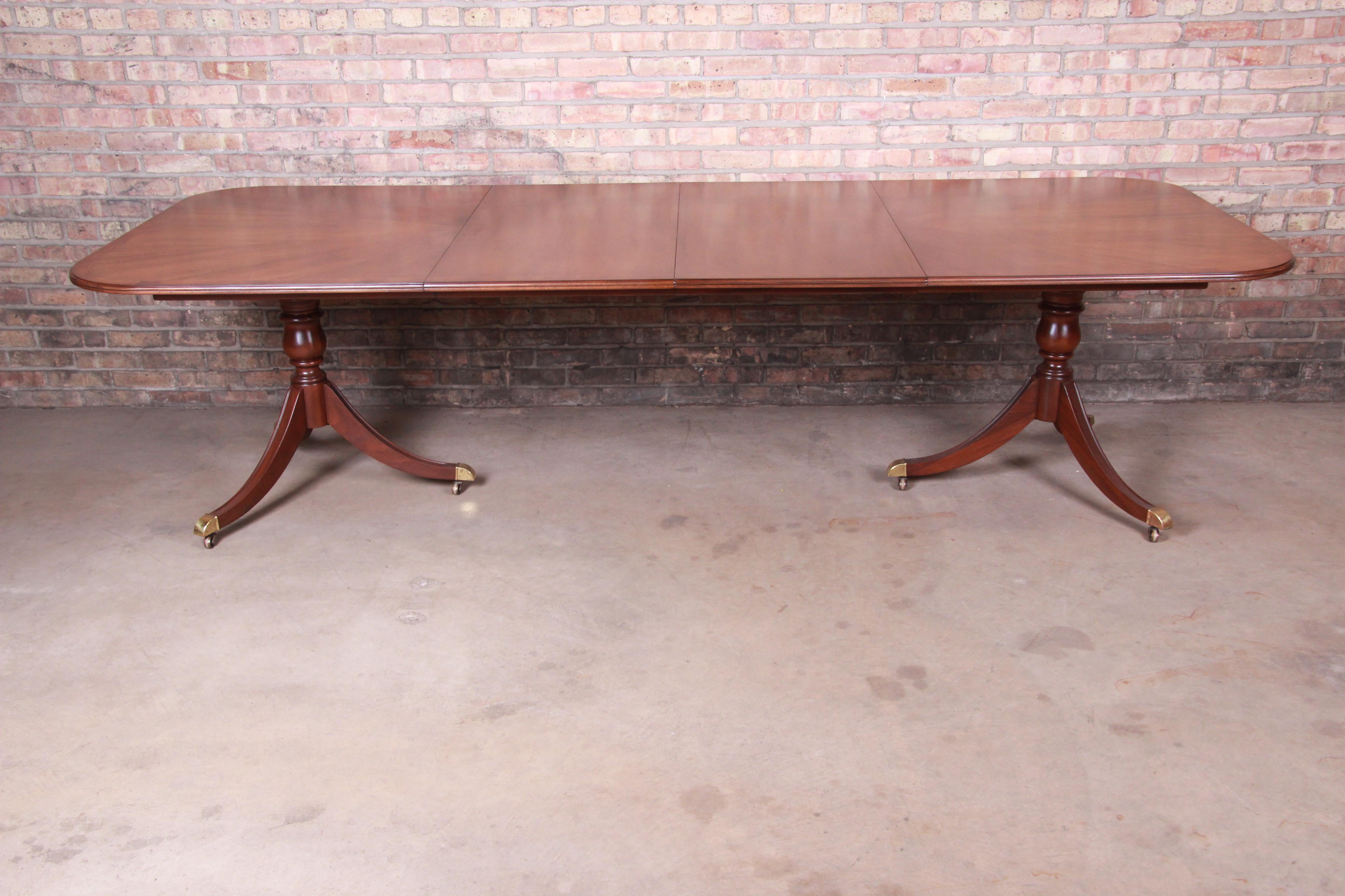 An exceptional Georgian style double pedestal extension dining table

By Drexel Heritage 