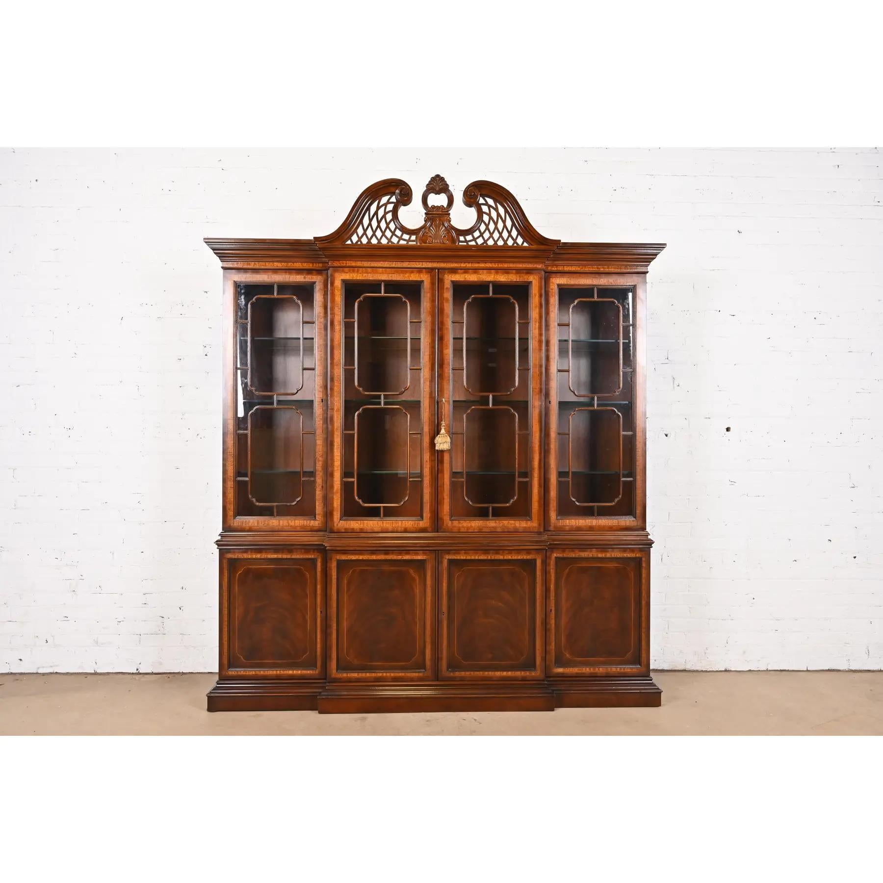 A gorgeous Georgian or Chippendale style lighted breakfront bookcase or dining cabinet

By Drexel Heritage, 
