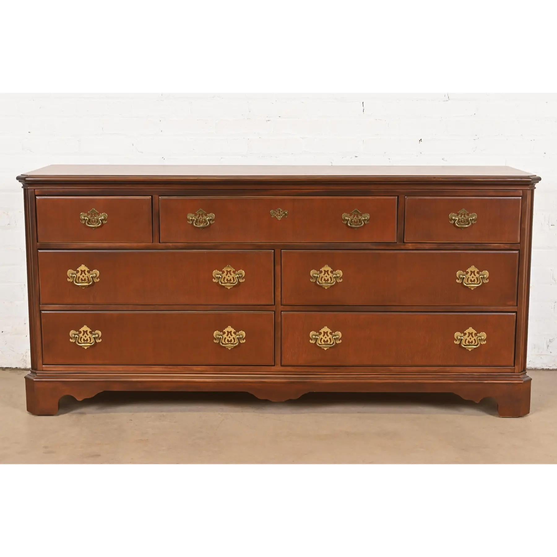 A gorgeous Georgian or Chippendale style seven-drawer dresser or credenza

By Drexel Heritage

USA, Circa 1980s

Beautiful mahogany, with original brass hardware.

Measures: 60
