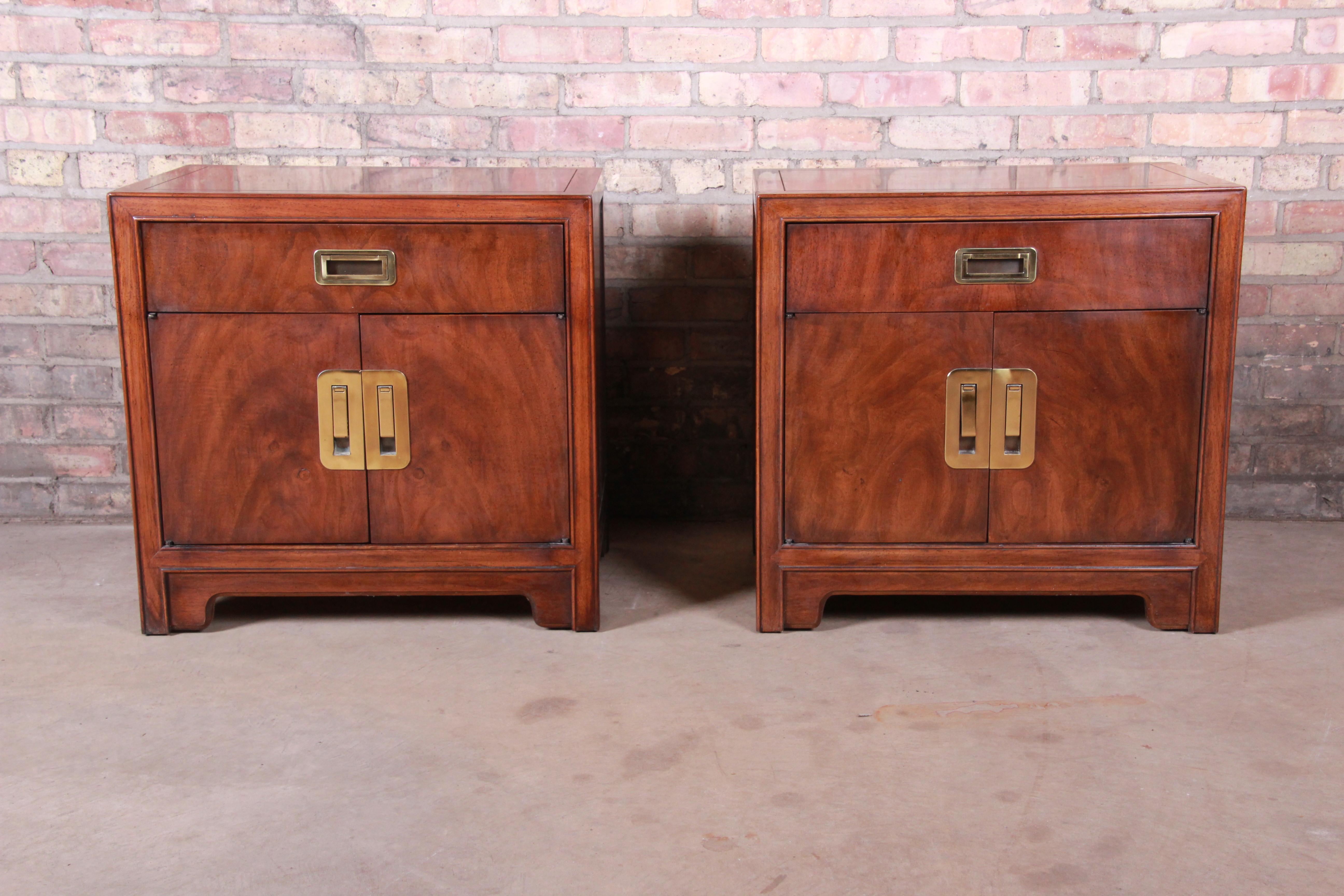 A gorgeous pair of Hollywood Regency Chinoiserie Campaign style nightstands

By Drexel Heritage 