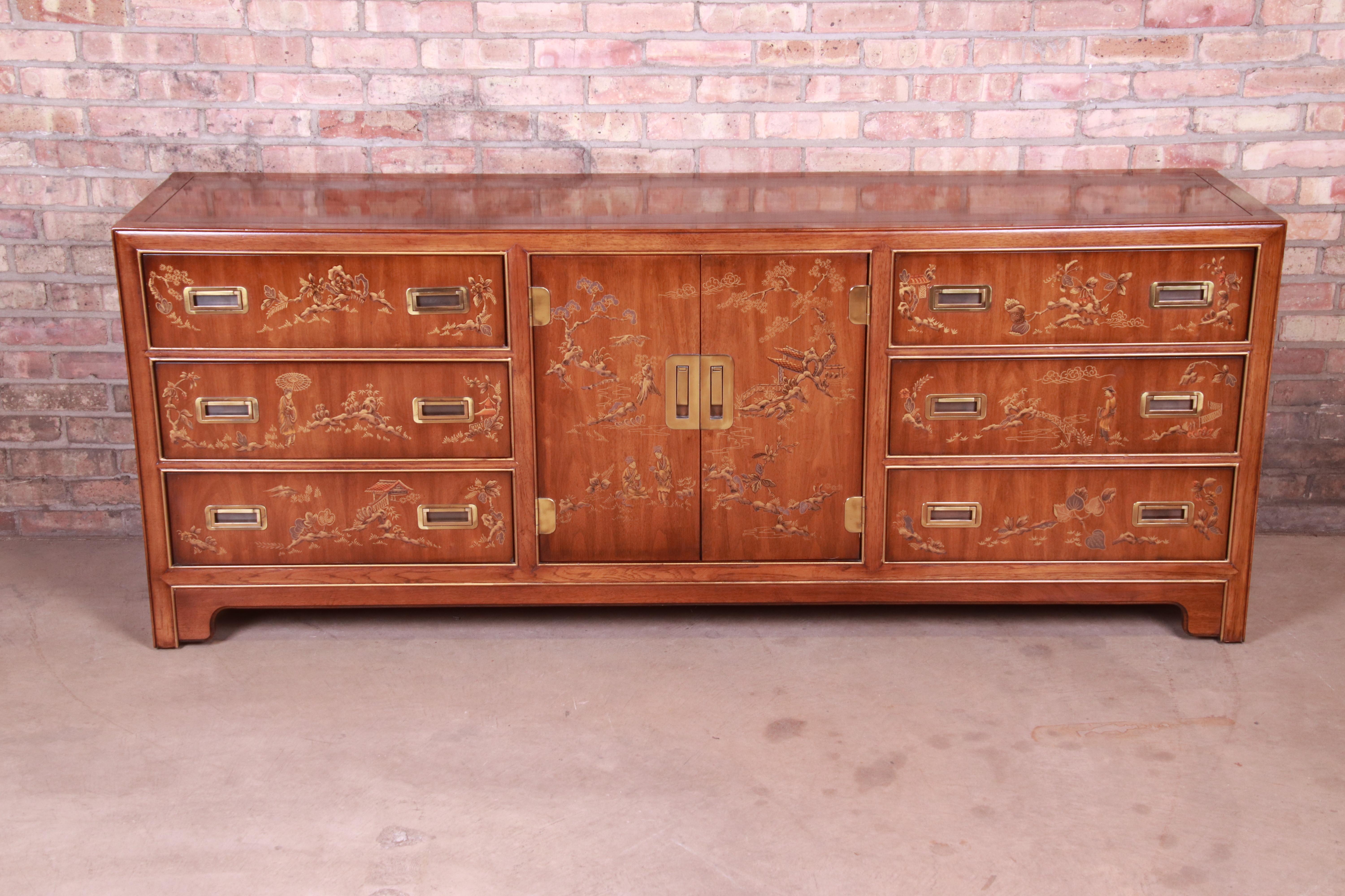 An exceptional midcentury Hollywood Regency Chinoiserie Campaign style nine-drawer long dresser or credenza

By Drexel Heritage 