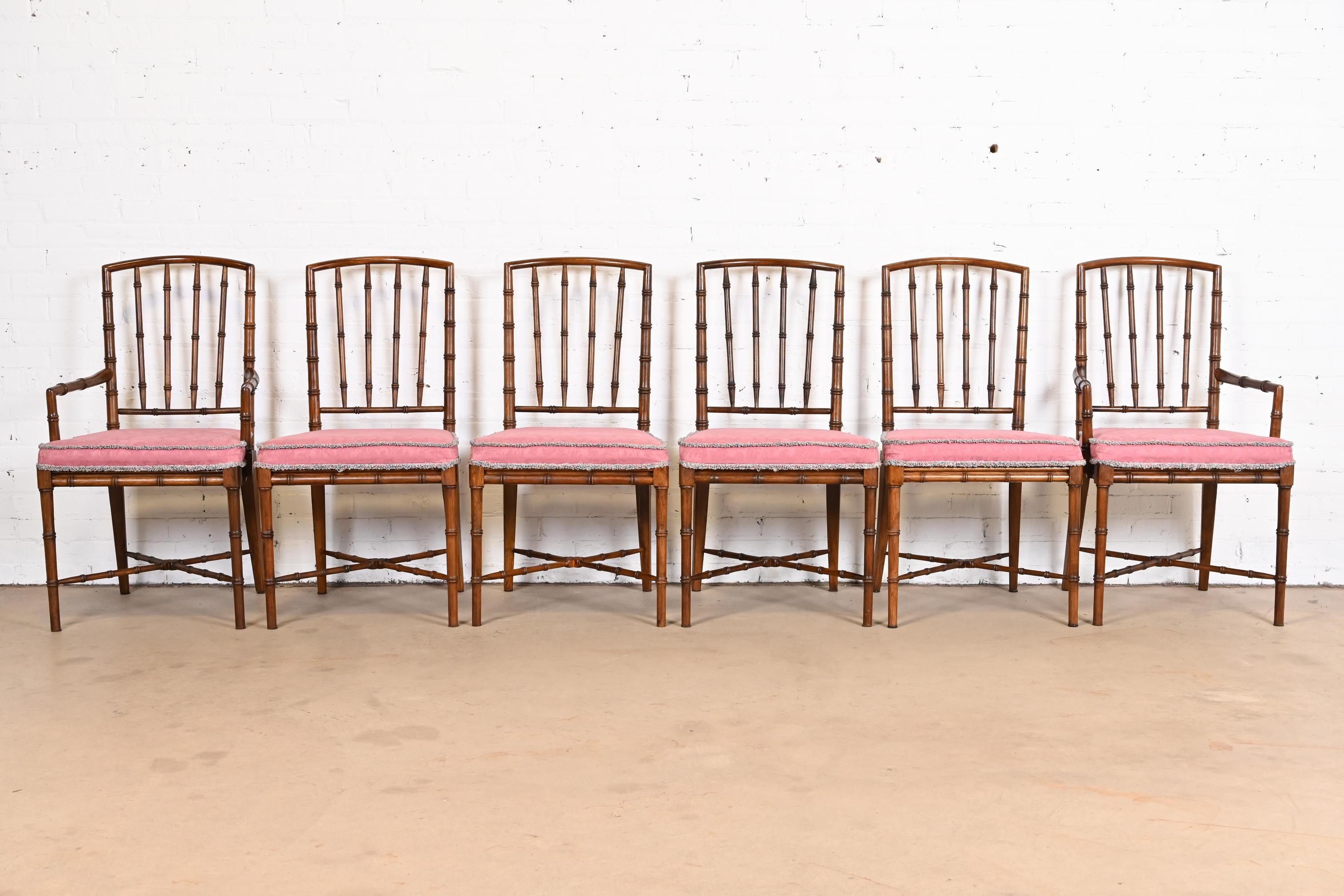 A gorgeous set of six Mid-Century Modern Hollywood Regency dining chairs

By Drexel Heritage

USA, 1970s

Solid walnut bamboo form frames, with pink upholstered seats.

Side chairs measure: 20