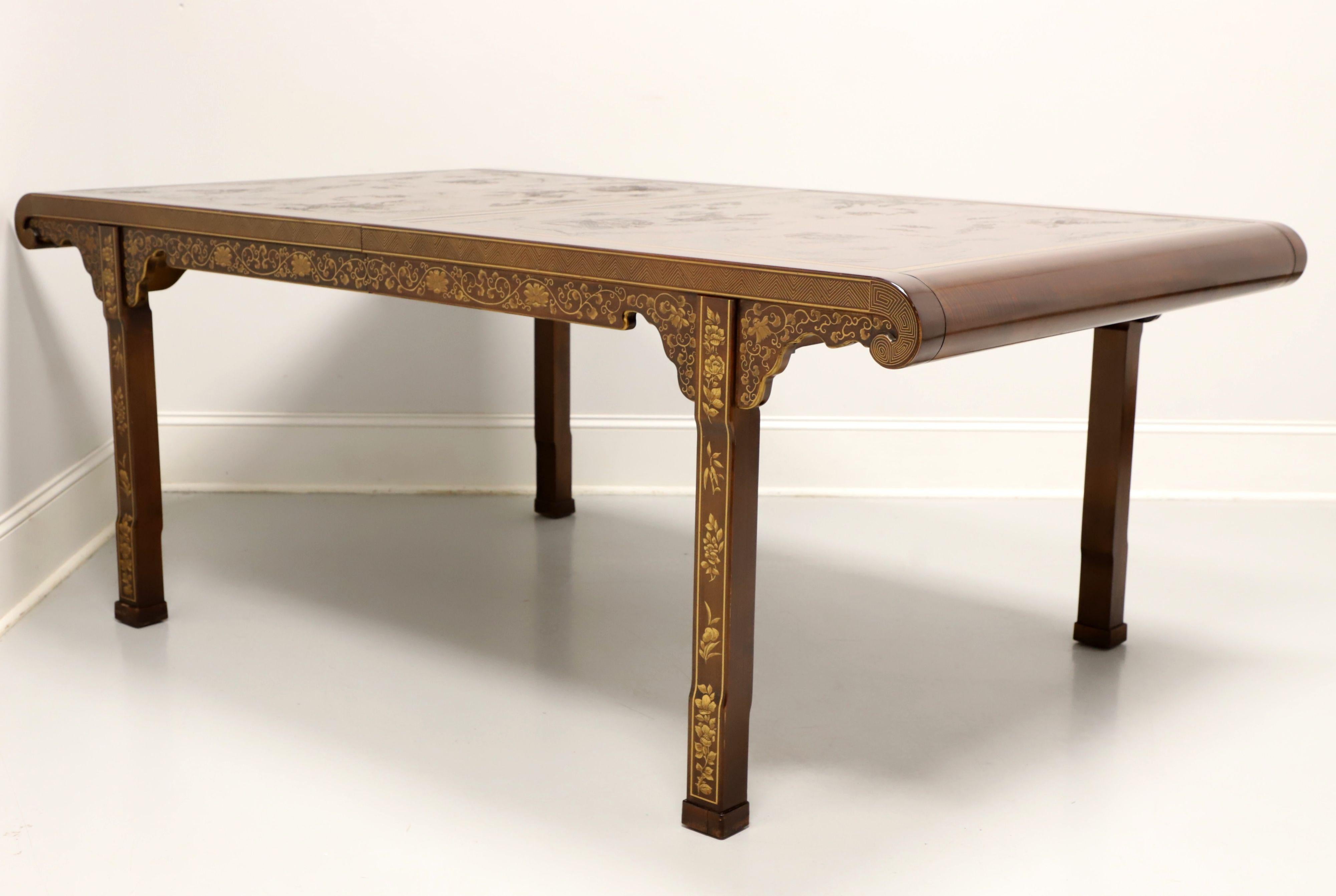 An Asian Ming style rectangular dining table by Drexel Heritage, from the Ming Treasures Collection. Mahogany & veneers, carved & painted Chinoiserie scenes with gold color banding to the top, rounded scroll-like ends, carved inlaid apron, straight