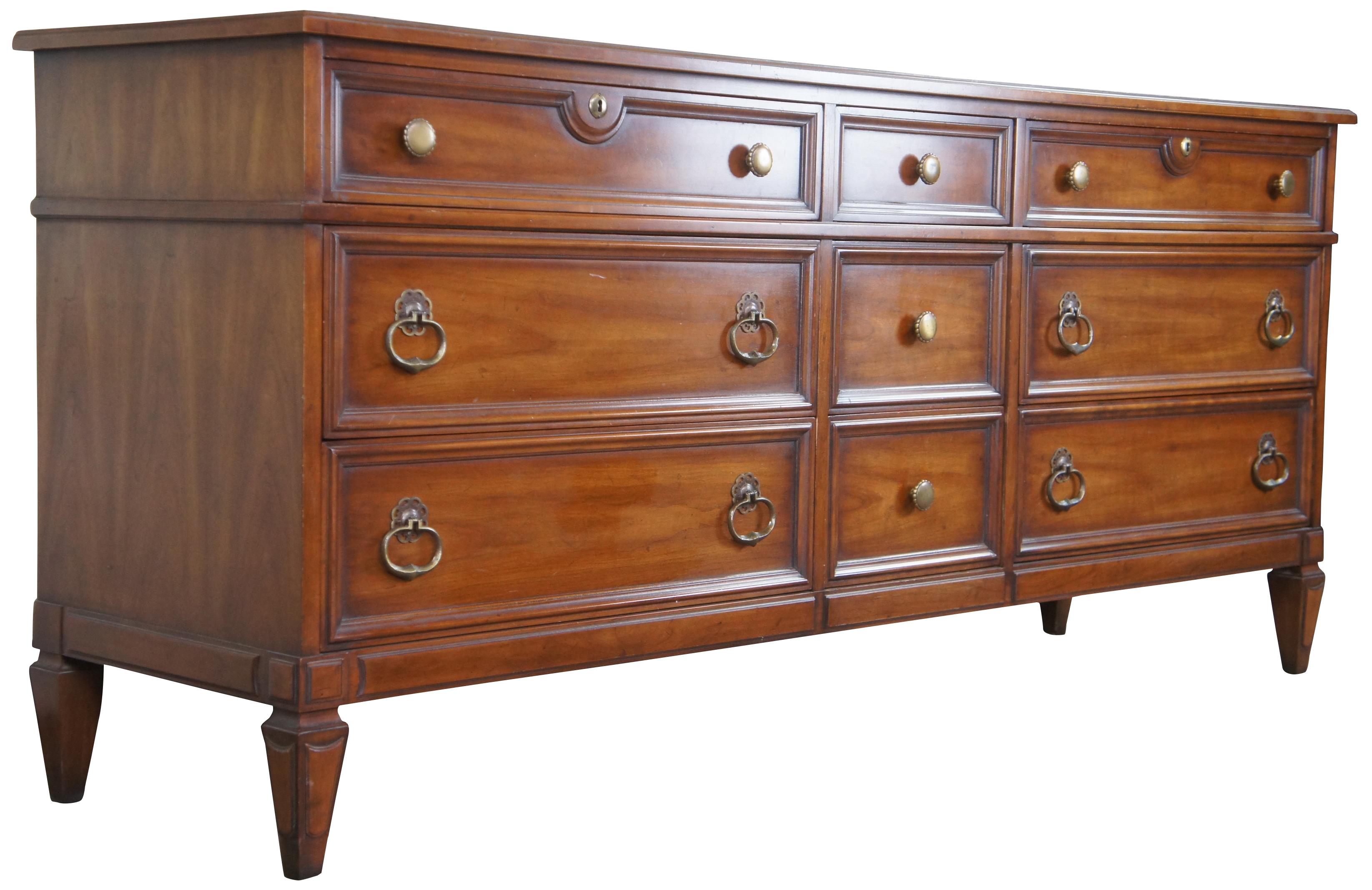 Circa 1960s Drexel Heritage Modavanti Mediterranean Collection Dresser, 14-153-30. Drawing inspiration from early Renaissance, Italian, classical and other European designs. A rectangular form made from fruitwood with nine dovetailed drawers