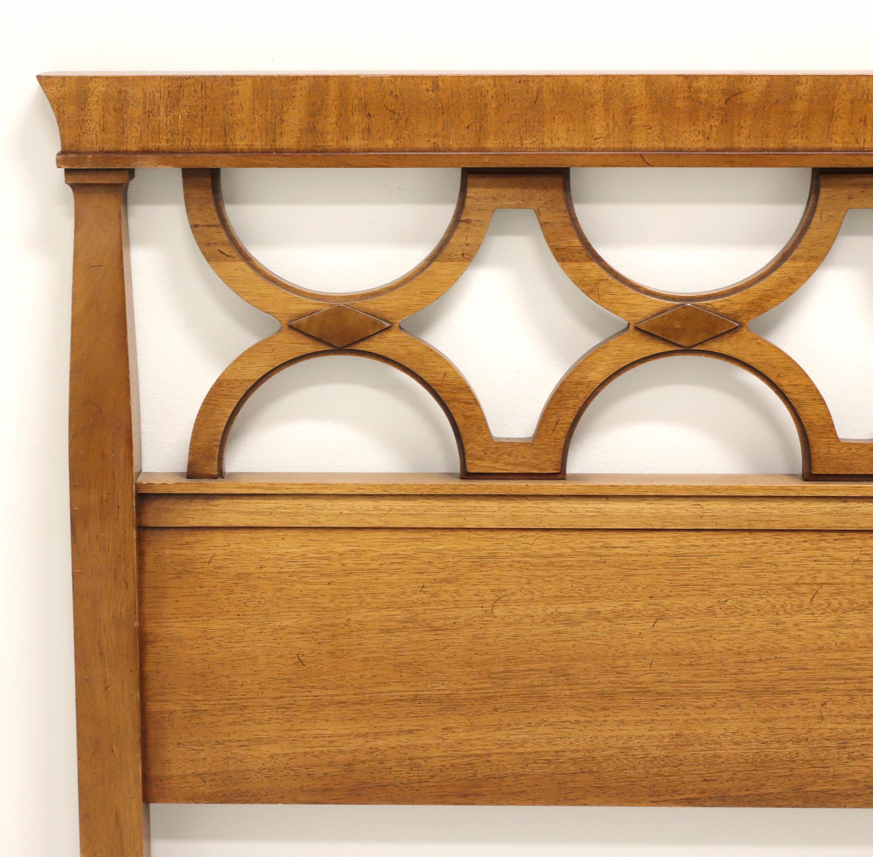 A pair of Neoclassical style twin size headboards by Drexel Furniture. Walnut with carved half circle detail, column like sides and entablature like top. Made in North Carolina, USA, in the mid 20th Century.

Measures: 42.75w 1.25d 38.25h

Very