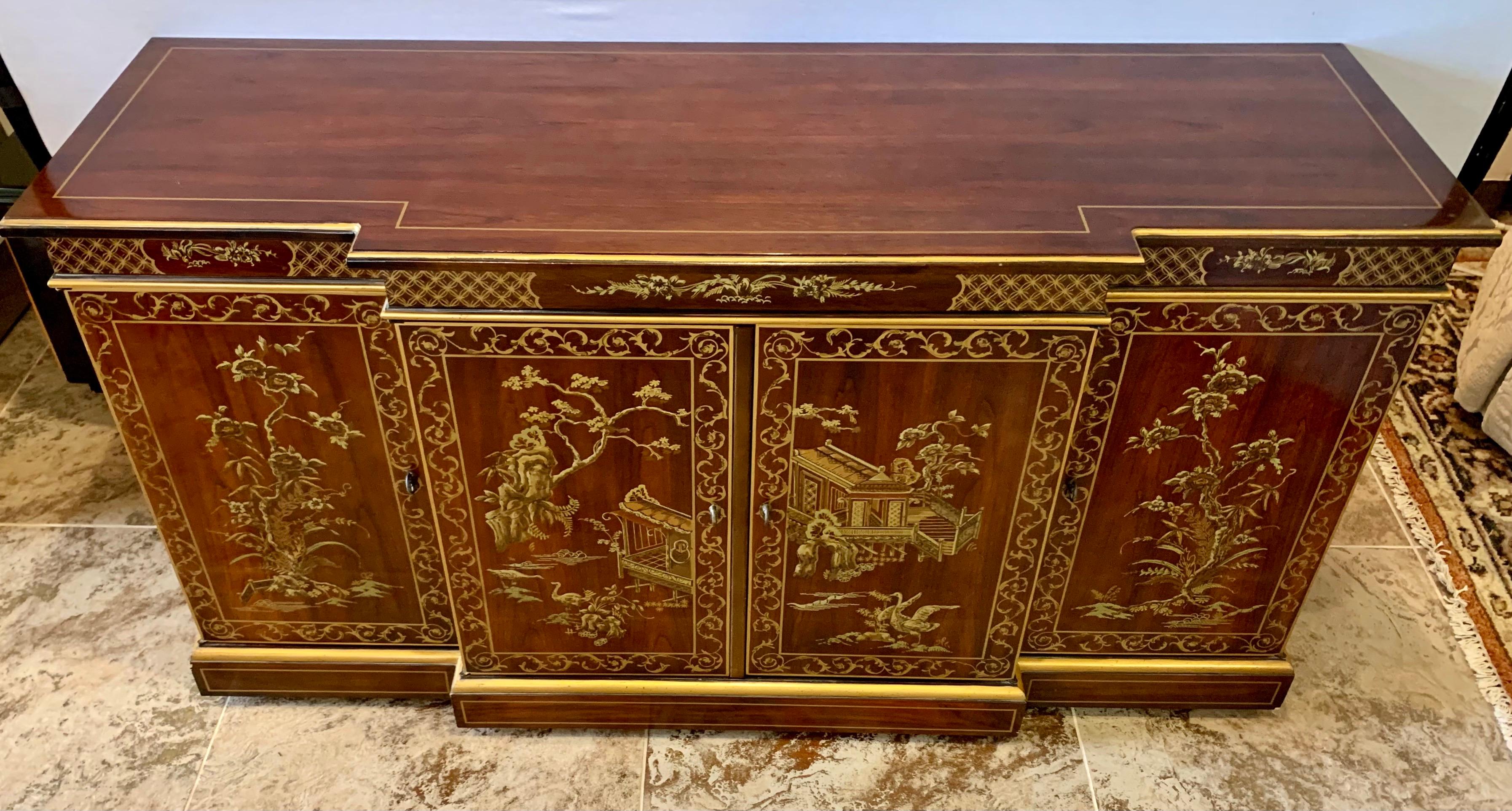 Signed Drexel chinoiserie sideboard/buffet with gorgeous period design as well as felt sterling silverware interior top drawer. If you are looking for storage but have exquisite taste, this could be for you. Mahogany wood throughout.