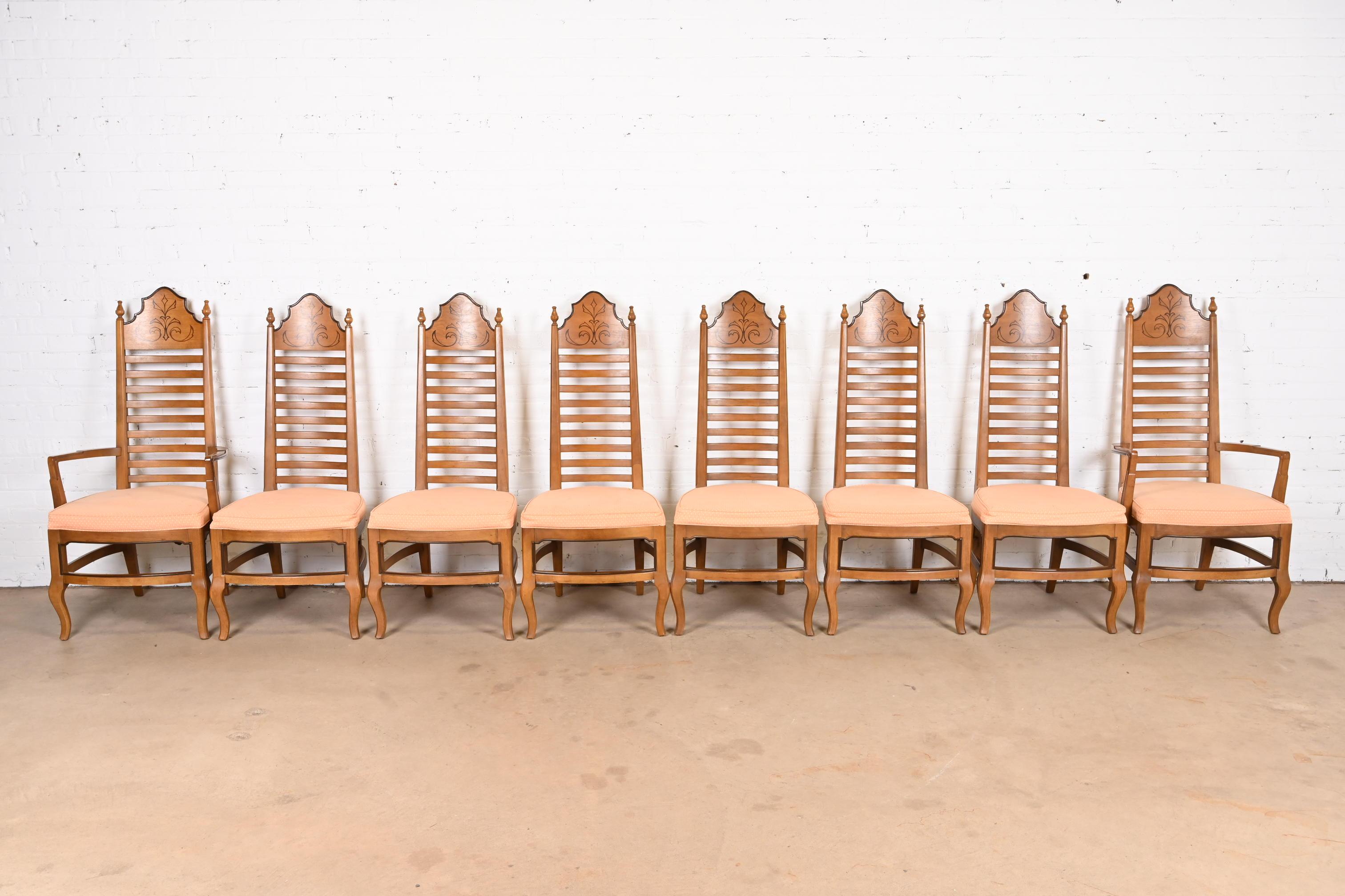 A gorgeous set of eight mid-century Italian Provincial or Mediterranean style high back dining chairs

By Drexel

USA, Circa 1960s

Carved walnut, with upholstered seats.

Measures:
Side chairs - 20