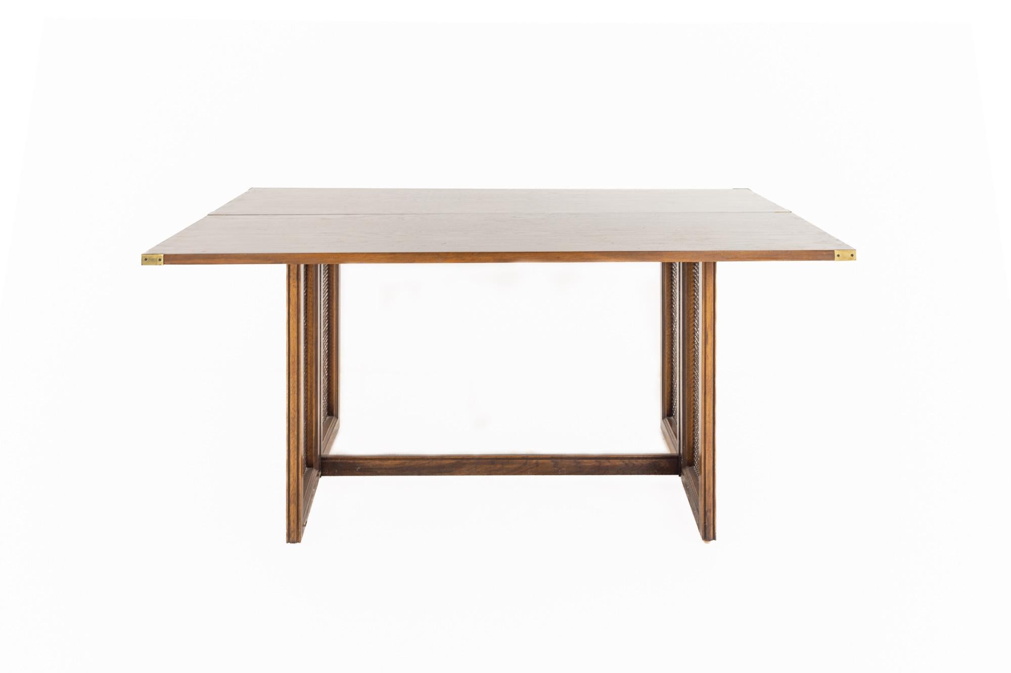 Drexel mid century walnut and cane flip console dining table

The table measures: 60 wide x 36 deep x 28.5 inches high

All pieces of furniture can be had in what we call restored vintage condition. That means the piece is restored upon purchase