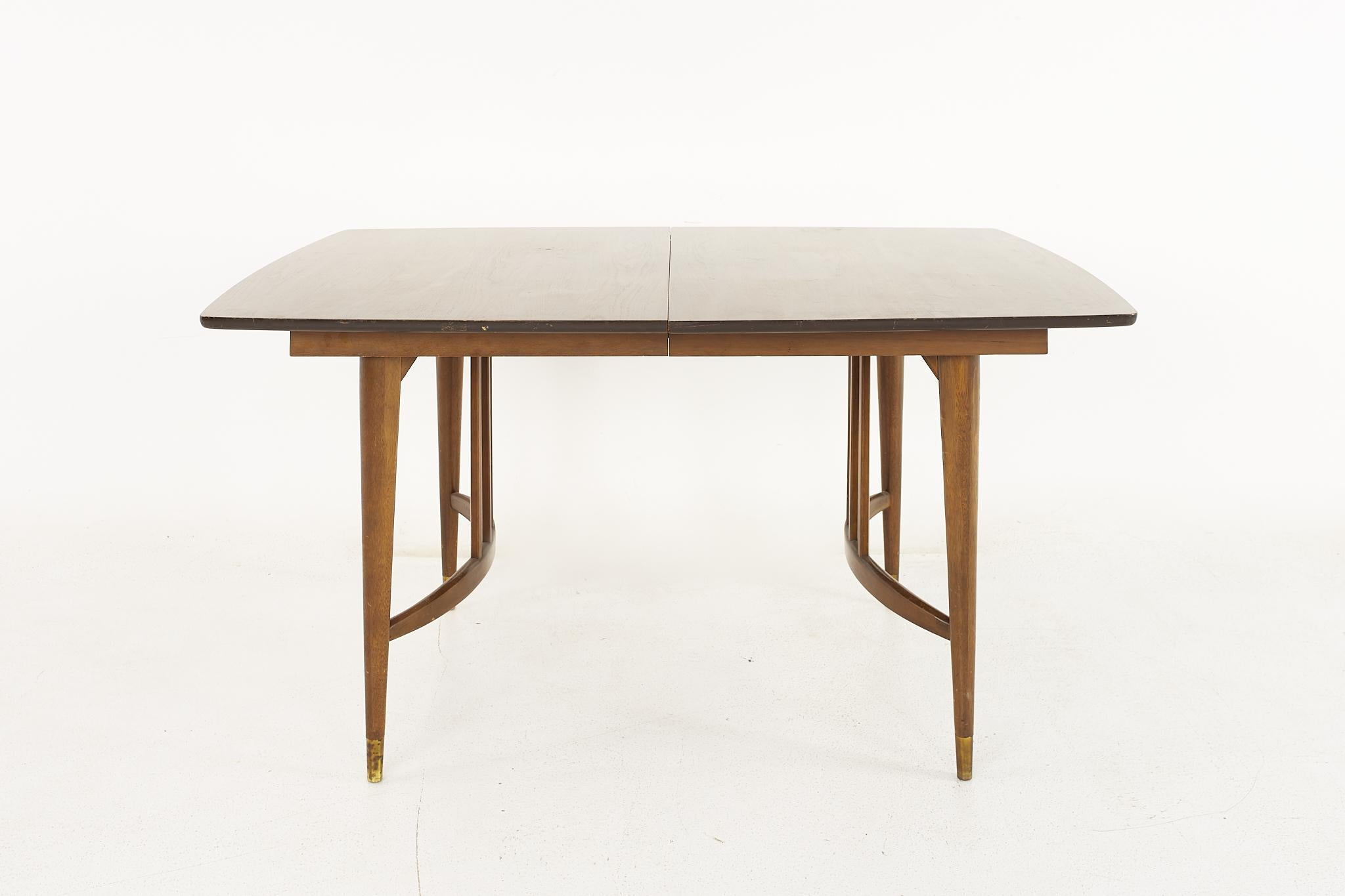 Drexel Mid Century Walnut Expanding Dining Table with 2 Leaves

The table measures: 57.5 wide x 40 deep x 29.5 inches high; each leaf is 12 inches wide, making a maximum table width of 81.5 inches when both leaves are used

All pieces of furniture