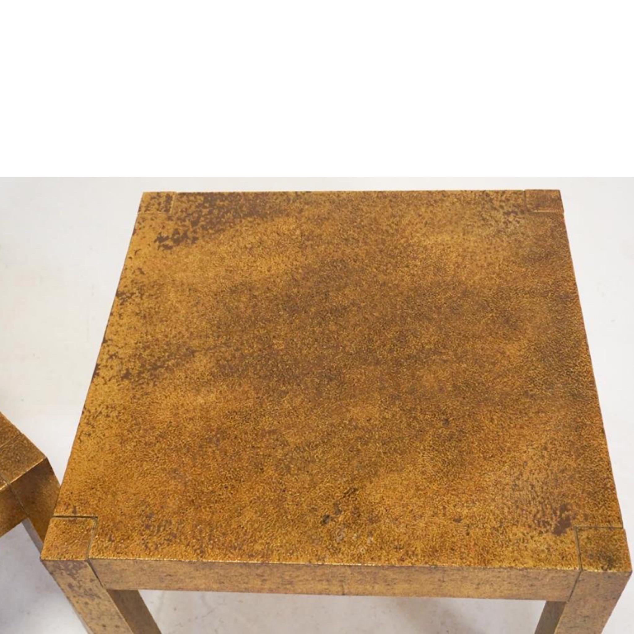 A fantastic pair of square parsons style side tables have a textured gold finish and are from Drexel’s Et Cetera line. Mid 20th century. Pair having a very nice gold gilt surface with tones of bronze. Nice original surface with some slight wear