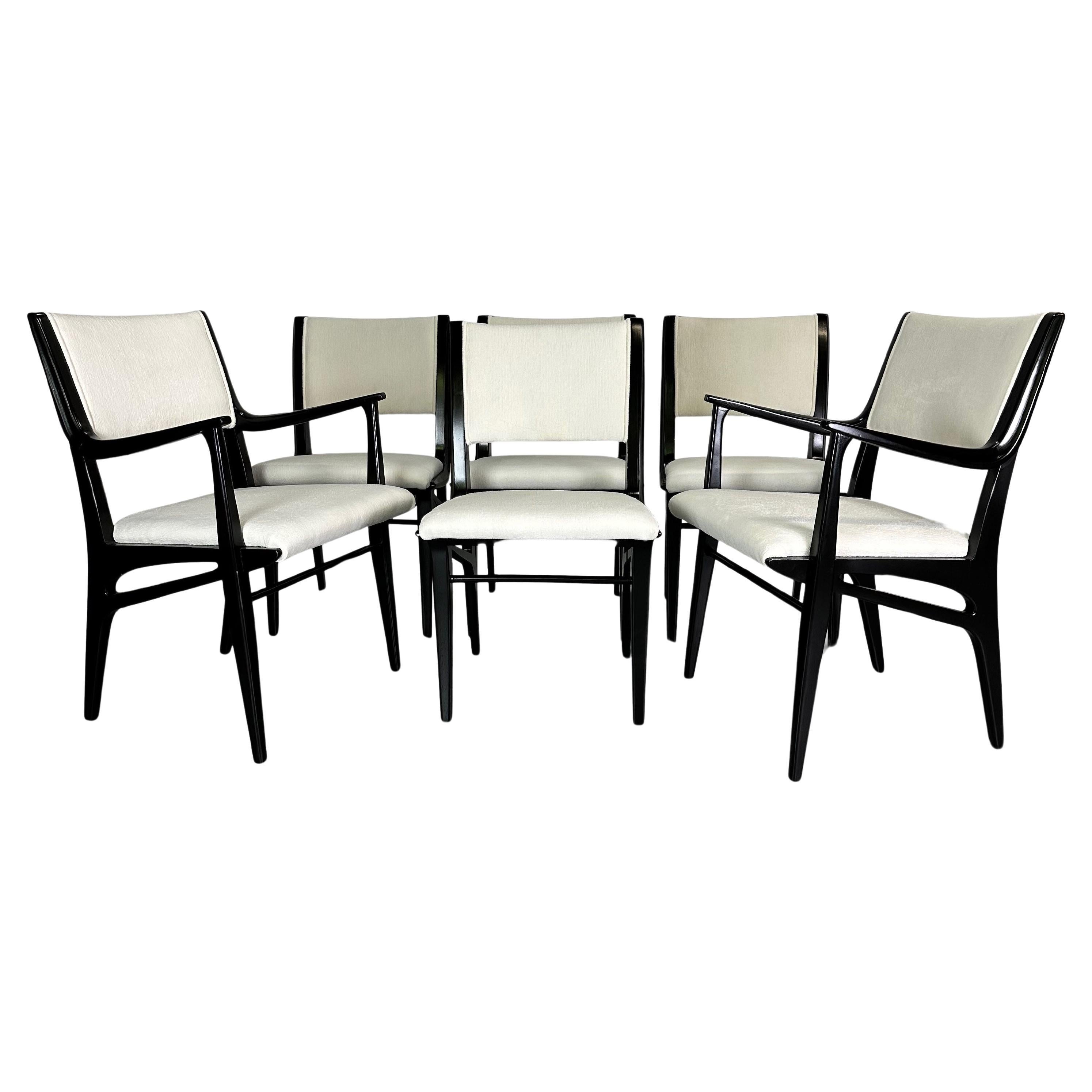 Wonderful set of six John Van Koert dining chairs, these incredibly designed chairs have a modernist style that is so sophisticated that they will enhance any dining room. These chairs have been lacquered black and upholstered in a textured white