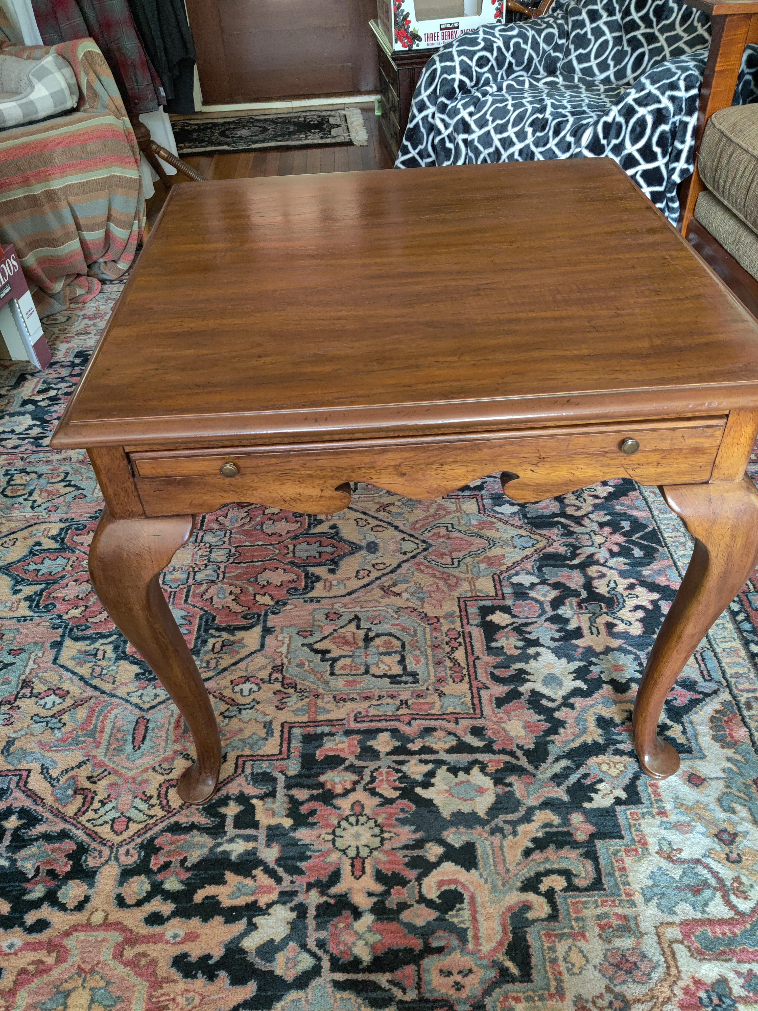 Drexel Tea Table with Queen Anne Legs and pull out shelf.
