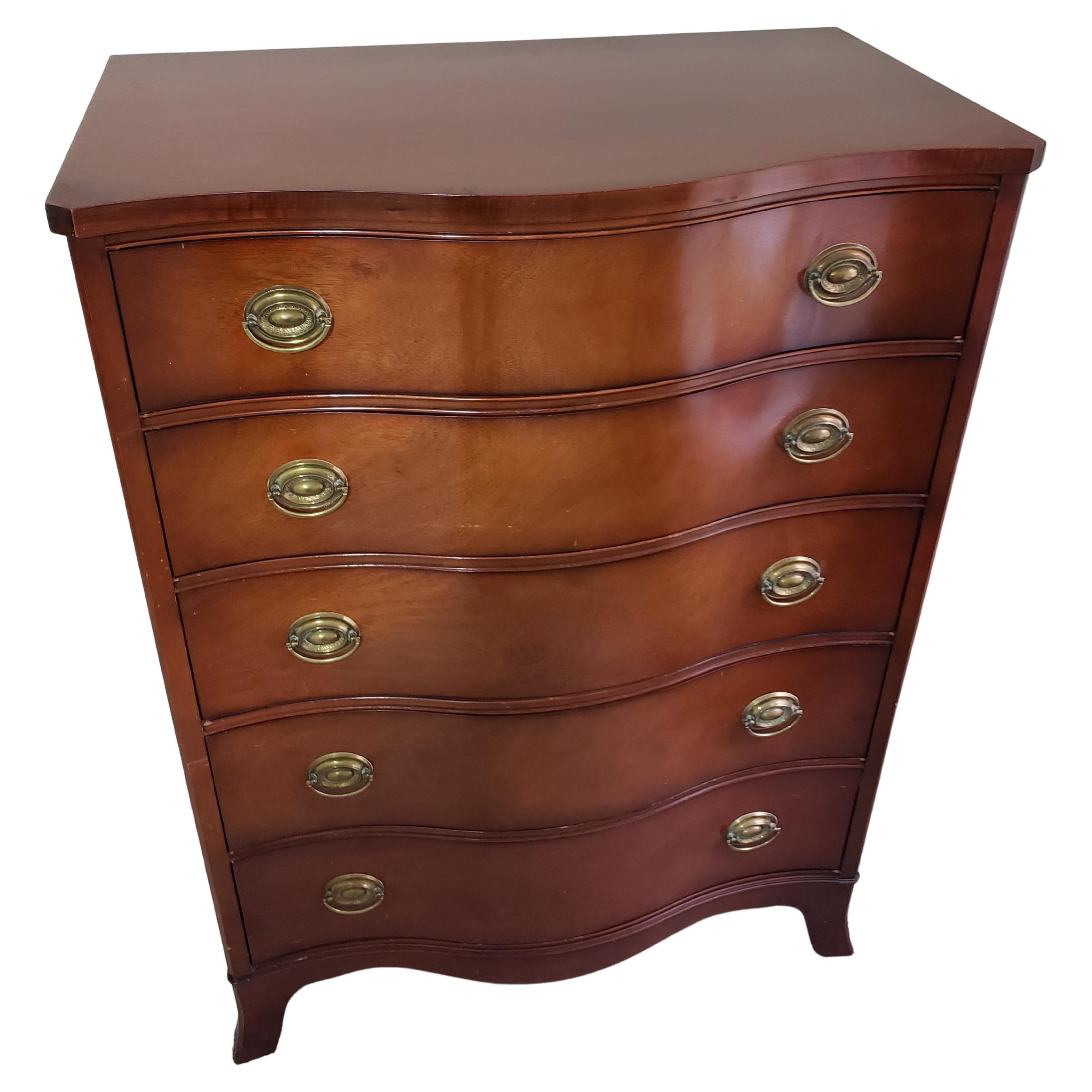 Drexel Travis Court Collection Mahogany Federal Chest of Drawers, Circa 1940s. 
5 deep dovetailed drawers, middle compartmented drawer. Very good vintage condition. All drawers perfectly functional. 
 Measures 36 inches in width, 21 inches in