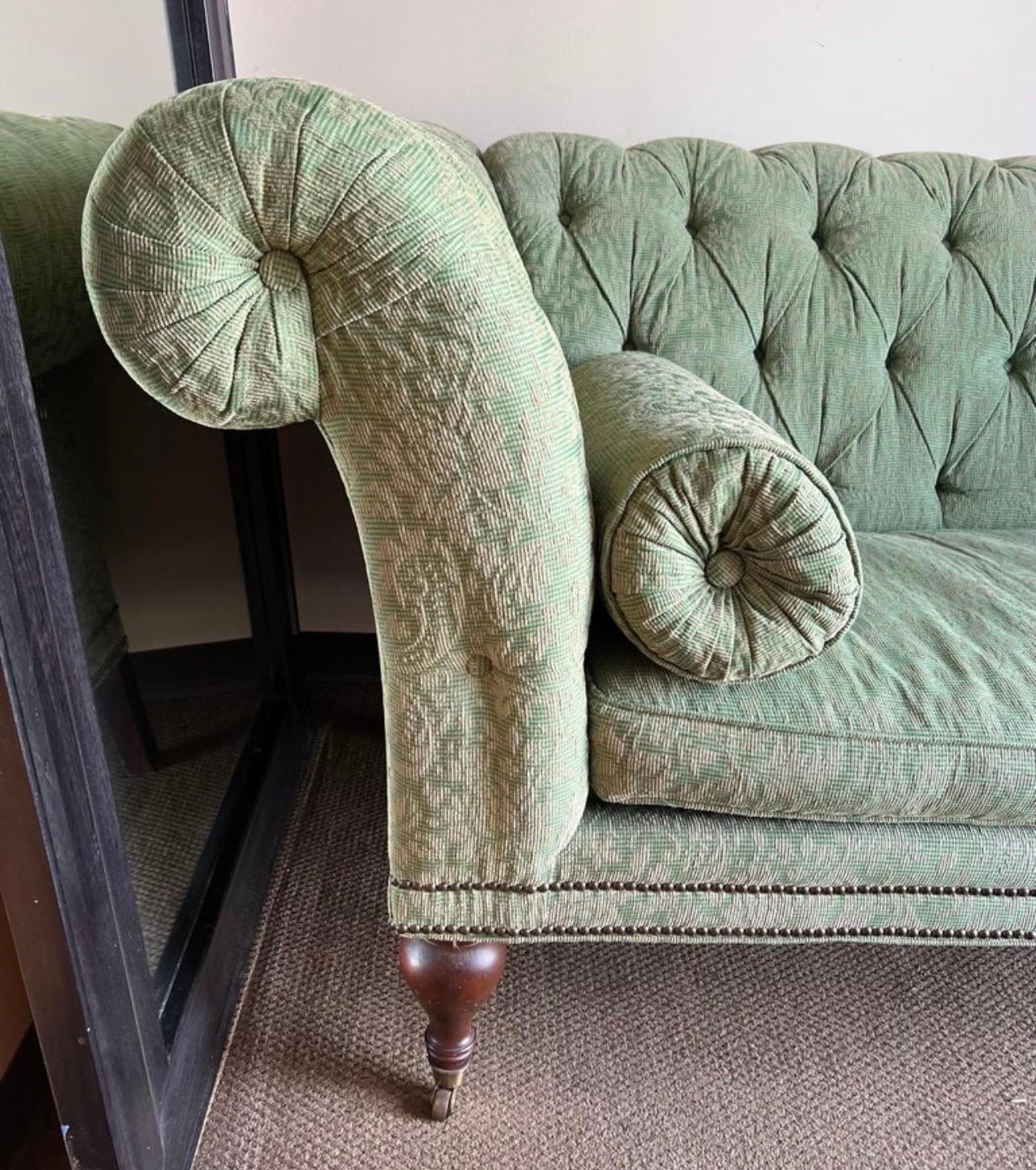 Elegant Drexel Furniture tufted roll arm chesterfield sofa done in a luxurious light green cotton fabric with beige design throughout. This sofa, measuring 89