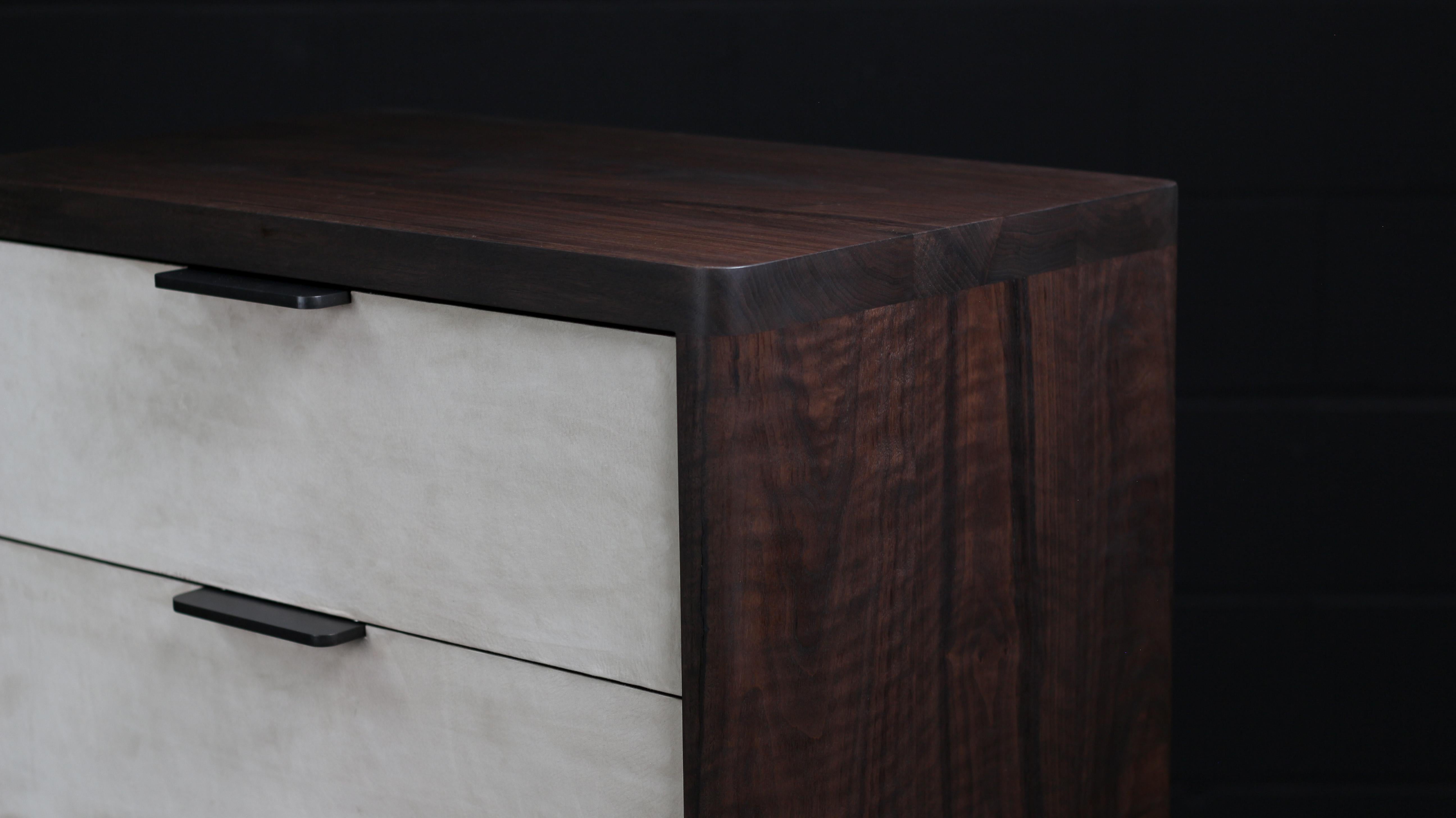 The Dreyfus Chest is designed to store daily and occasional objects. The solid wood drawers & doors feature leather fronts. The sleek metal hardware is studio-machined and polished by hand. Wood surfaces have a hand rubbed hardwax oil finish that