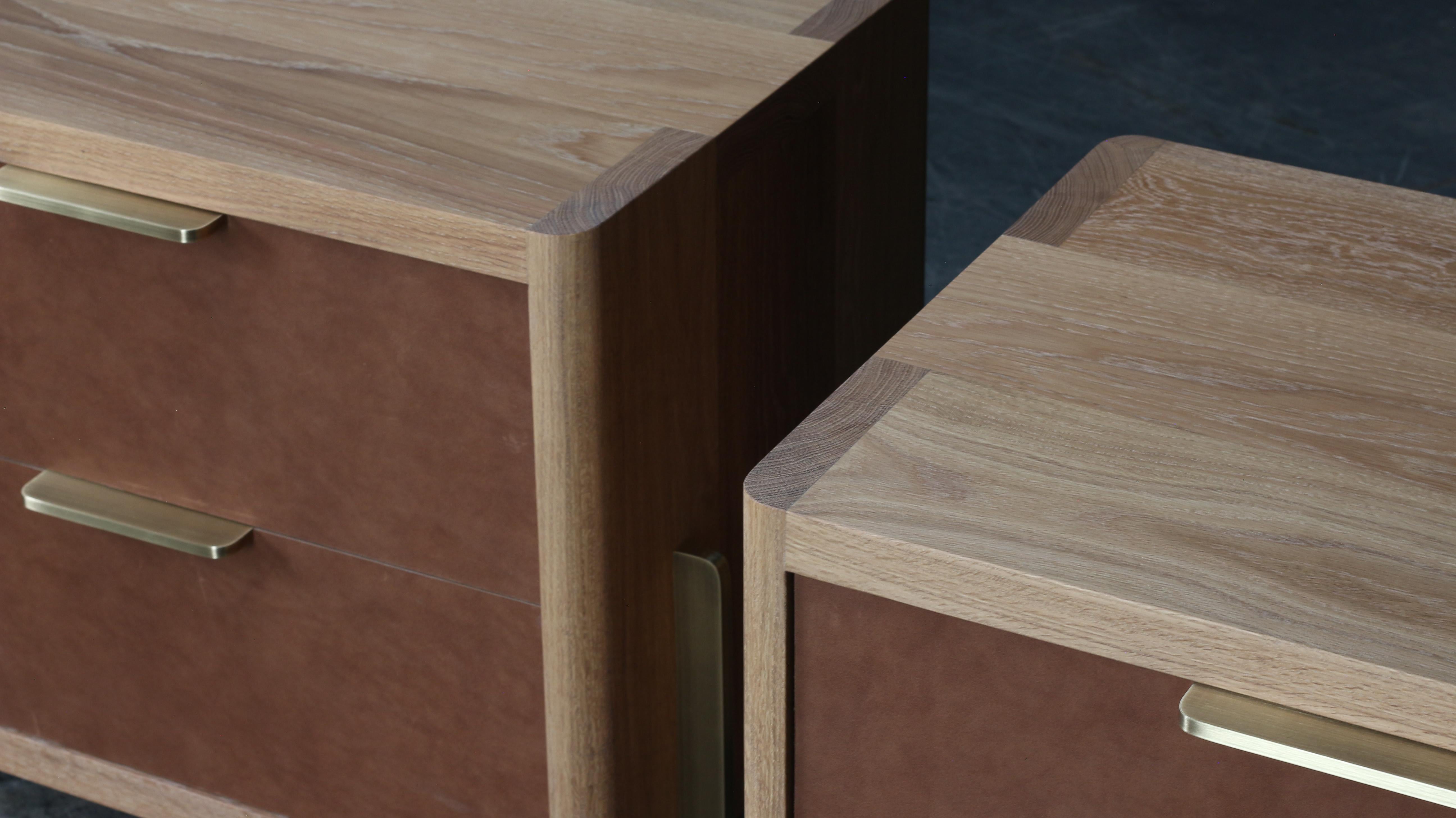 The Dreyfus Night Stand is made-to-order. Designed to store daily and occasionnals objects. The solid wood drawers features leather veneer fronts. The Antique Brass hardware is studio-machined and polished by hand. Wood surfaces has an hand rubbed