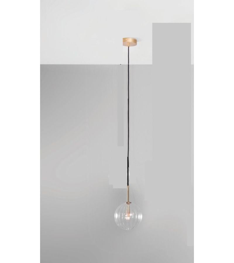 Contemporary Globe chandelier 20 by Schwung
Dimensions: D 20 x W 20 x H 336 cm 
Materials: Solid brass, hand-blown glass textured globes.
Finish: Natural Brass. 
Available in finishes: Polished Nickel or Black Gunmetal. Also available in other