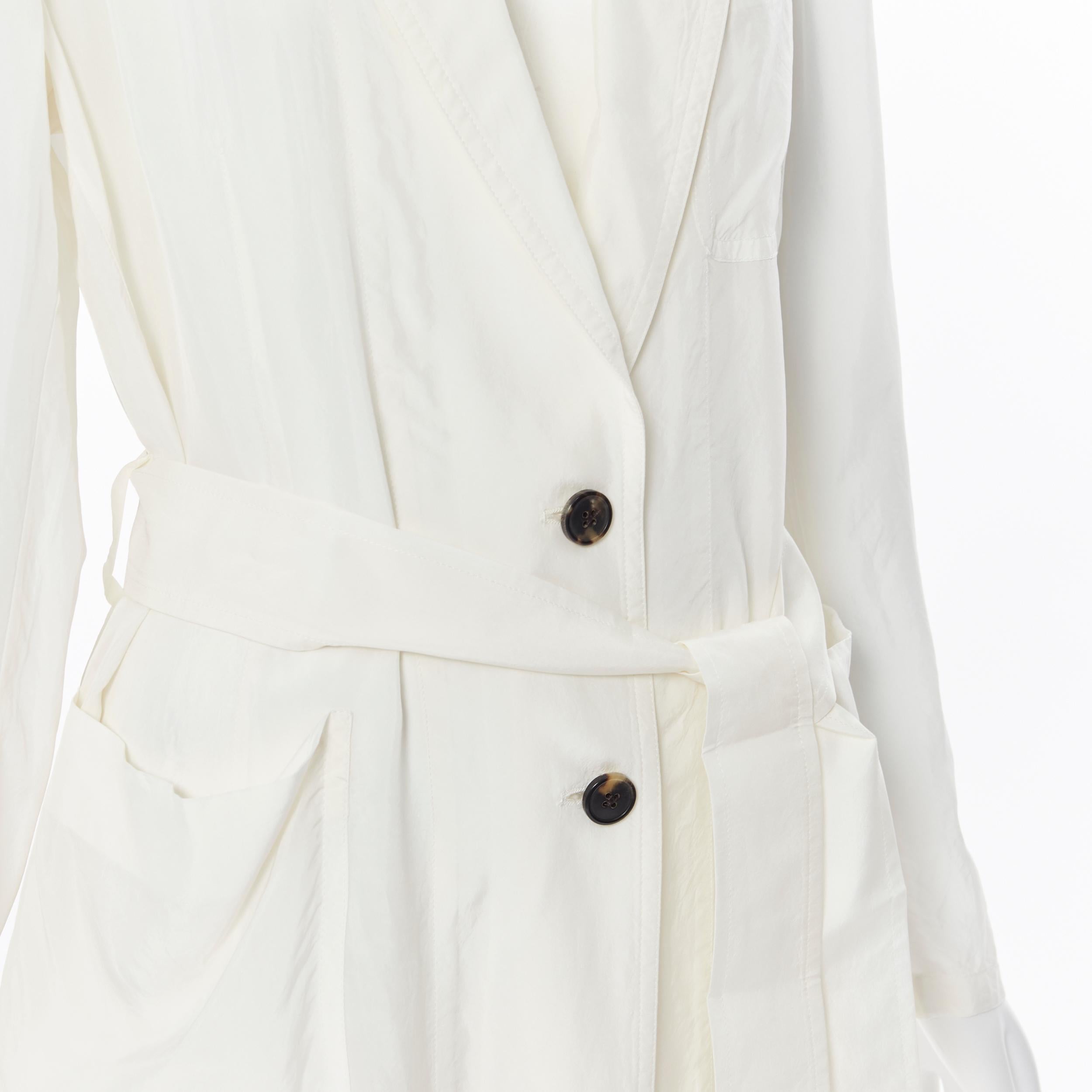 DRIES VAN NOTEN 100% cupro white turtoise resin button long lab coat Fr38 S
Brand: Dries Van Noten
Designer: Dries Van Noten
Model Name / Style: Cupro coat
Material: Cupro
Color: White
Pattern: Solid
Closure: Button
Extra Detail: 3-pocket design.