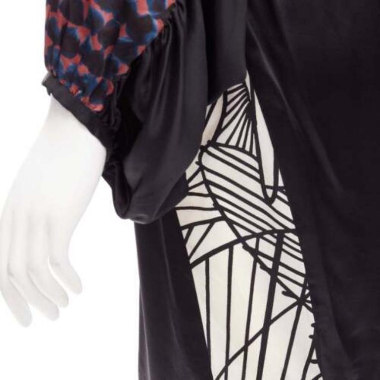 DRIES VAN NOTEN 100% silk black mixed print belted billow knee dress FR36 S
Reference: CELG/A00278
Brand: Dries Van Noten
Material: Silk
Color: Black, Multicolour
Pattern: Geometric
Closure: Belt
Made in: Slovakia

CONDITION:
Condition: Excellent,