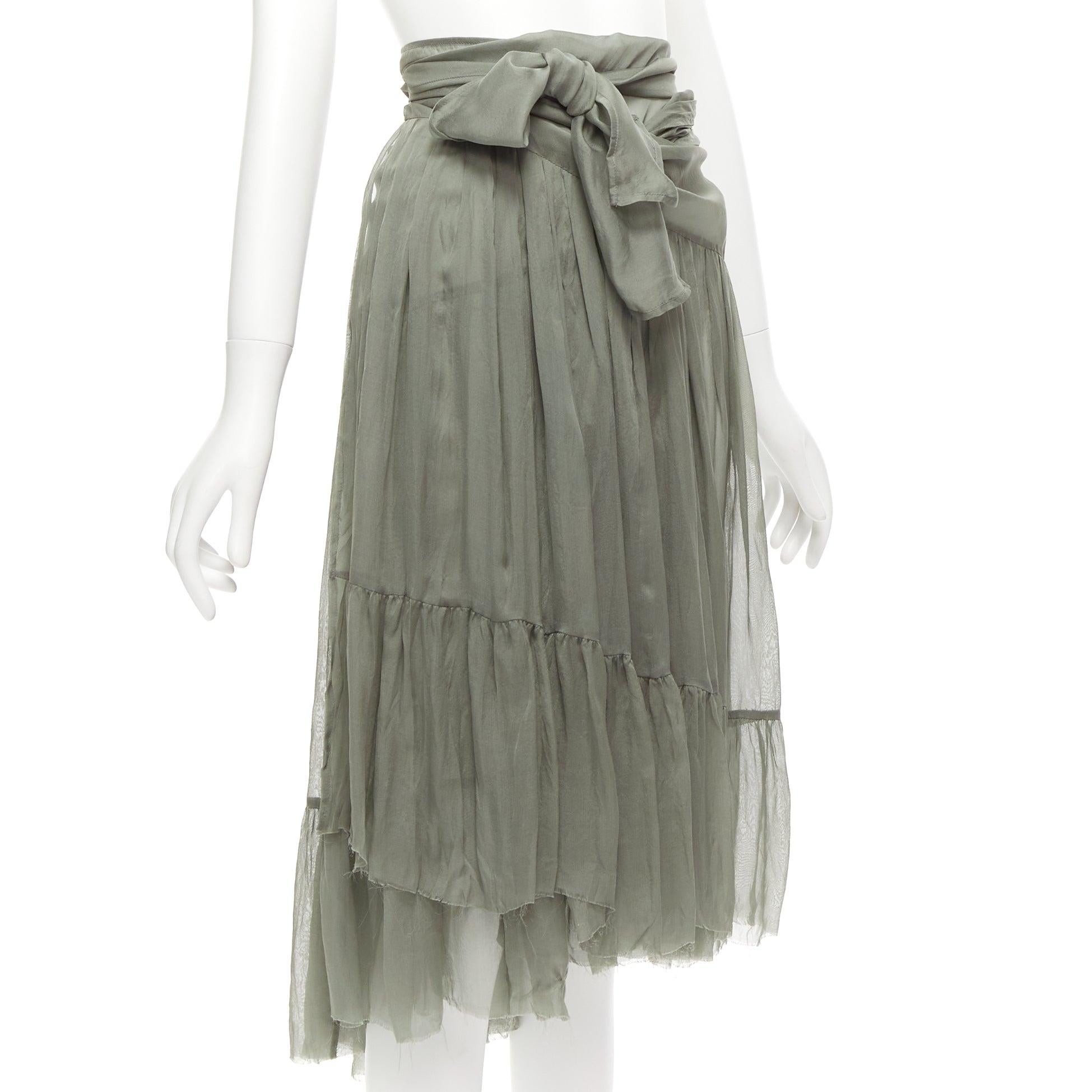 DRIES VAN NOTEN 100% silk military green sheer wrap tie skirt FR38 M
Reference: CELG/A00271
Brand: Dries Van Noten
Material: Silk
Color: Green
Pattern: Solid
Closure: Wrap Tie
Made in: Belgium

CONDITION:
Condition: Very good, this item was