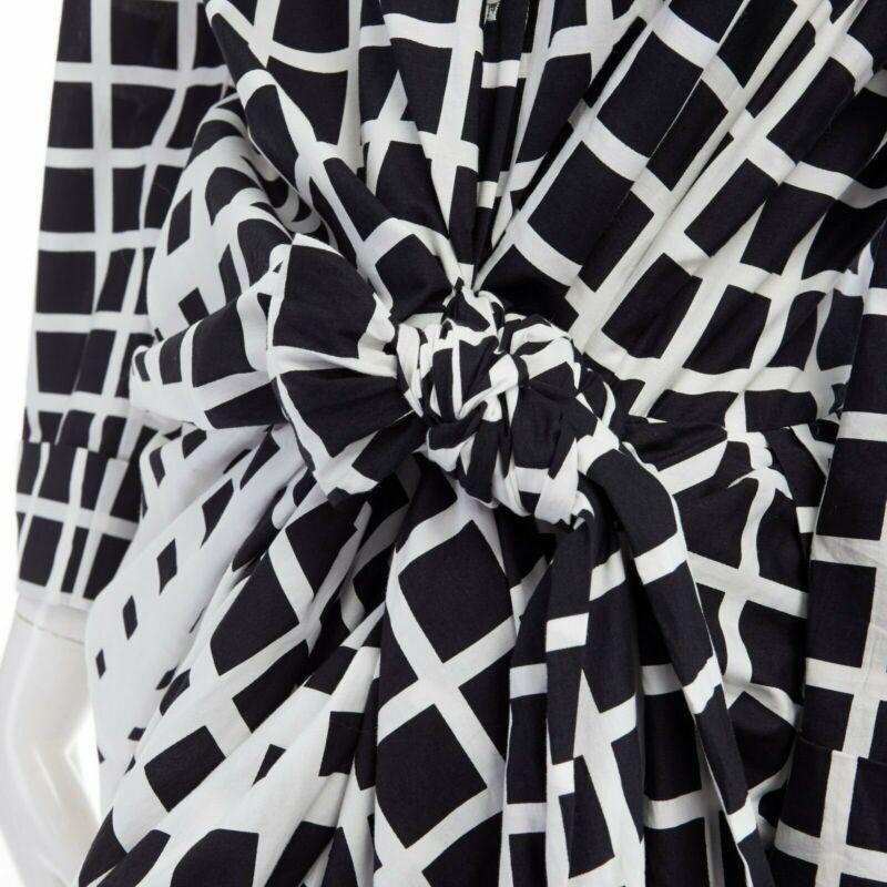 DRIES VAN NOTEN 2009 Runway black white checked wrap bustle knot dress FR36 S
Reference: CNLE/A00141
Brand: Dries Van Noten
Collection: Spring Summer 2009 - Runway
As seen on: The Metropolitan Museum of Arts
Material: Cotton
Color: Black,