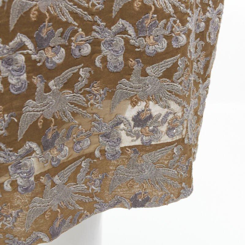 DRIES VAN NOTEN 2012 vestido dorado con bordado de grulla oriental FR36 S
Referencia: TGAS/B02199
Marca: Dries van Noten
Colección: 2012
Material: 100% Seda
Color: Dorado, Negro
Patrón: Sólido
Cierre: Botón
Forro:  Seda
Detalles adicionales: 100%
